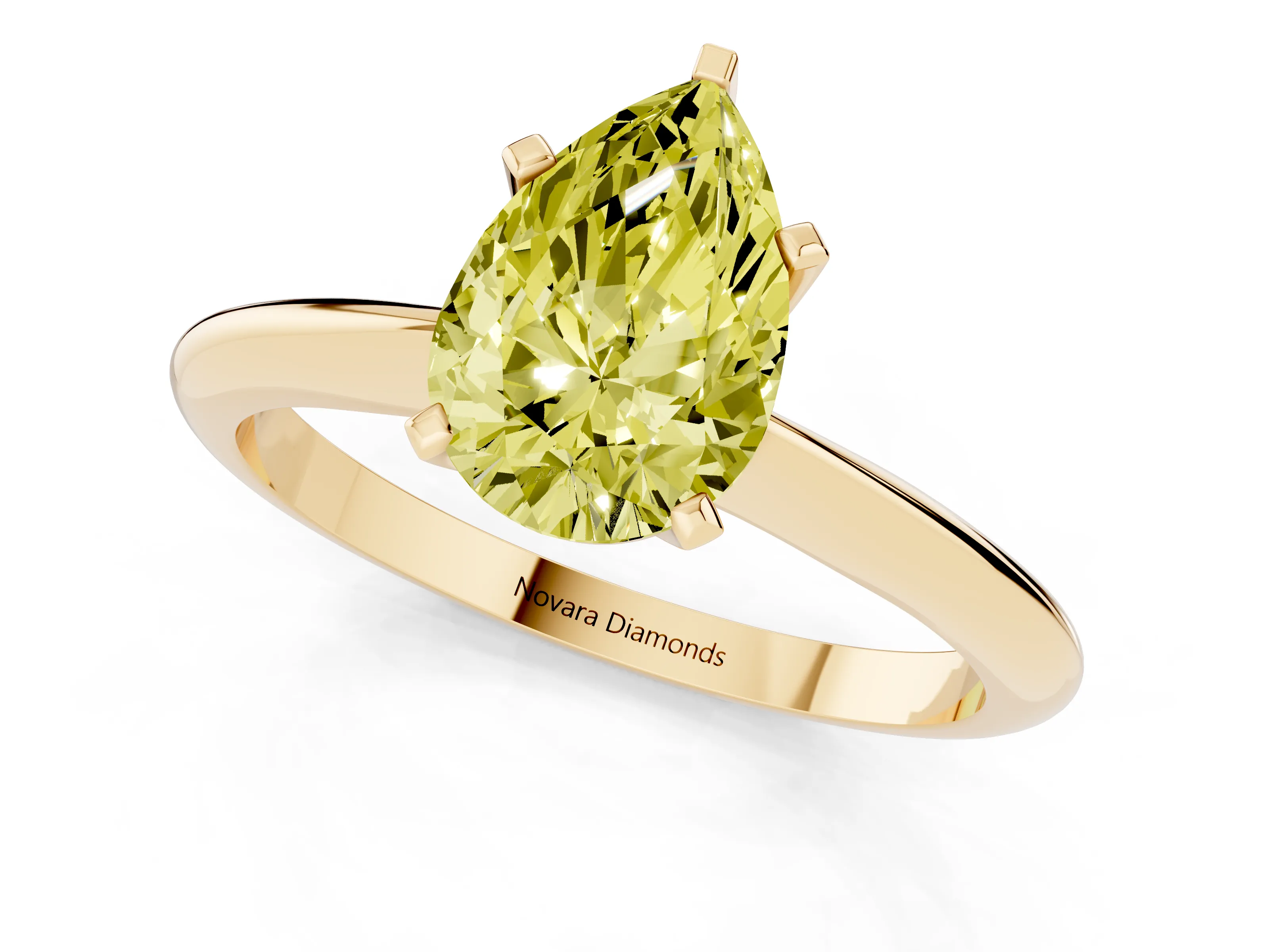 Fancy Yellow Pear Cut Diamond Solitaire Ring Set in Yellow gold with Prong Setting on a Plain Round Band