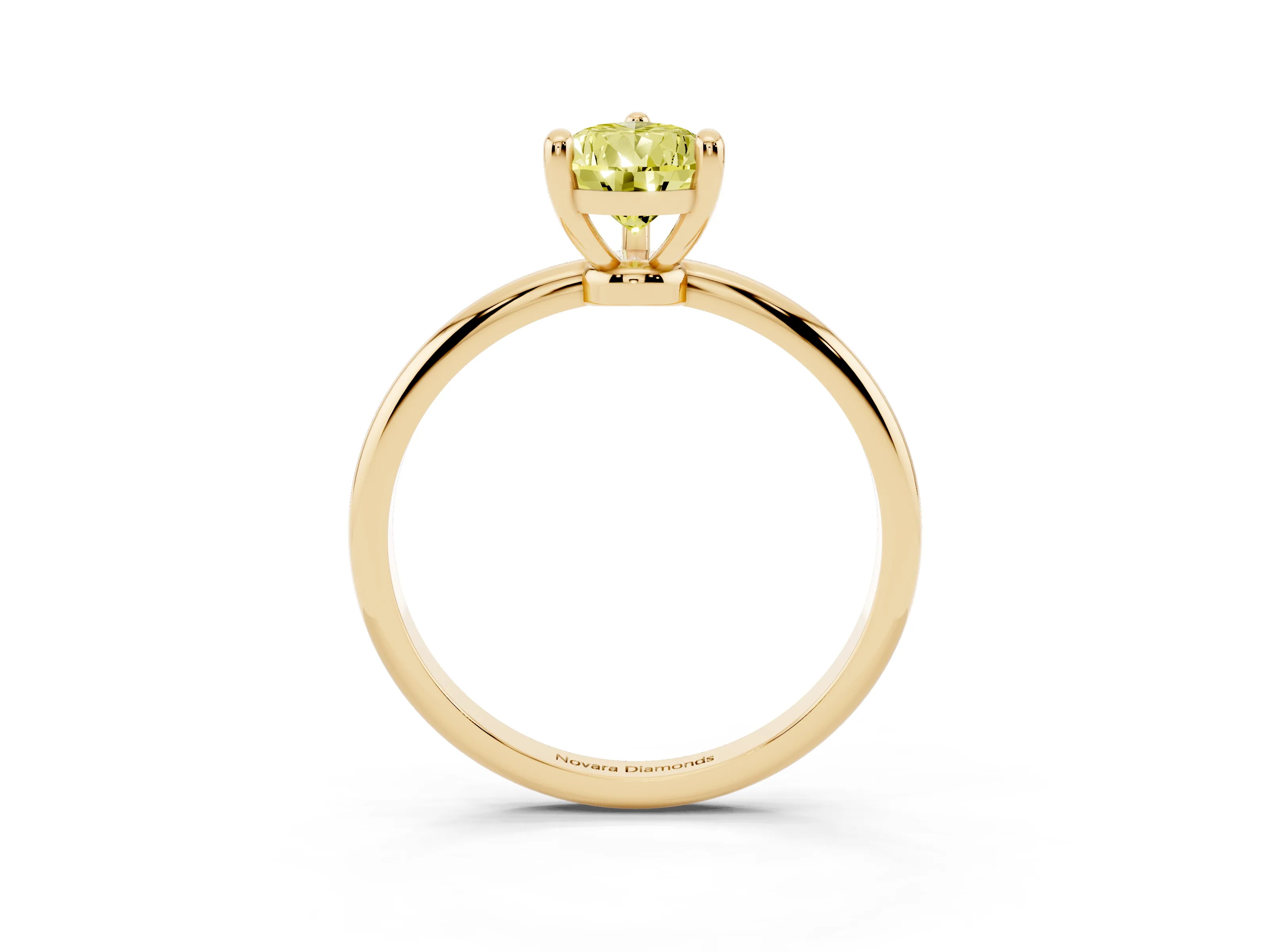 Fancy Yellow Pear Cut Diamond Solitaire Ring Set in Yellow gold with Secure Prong Setting on a Classic Band