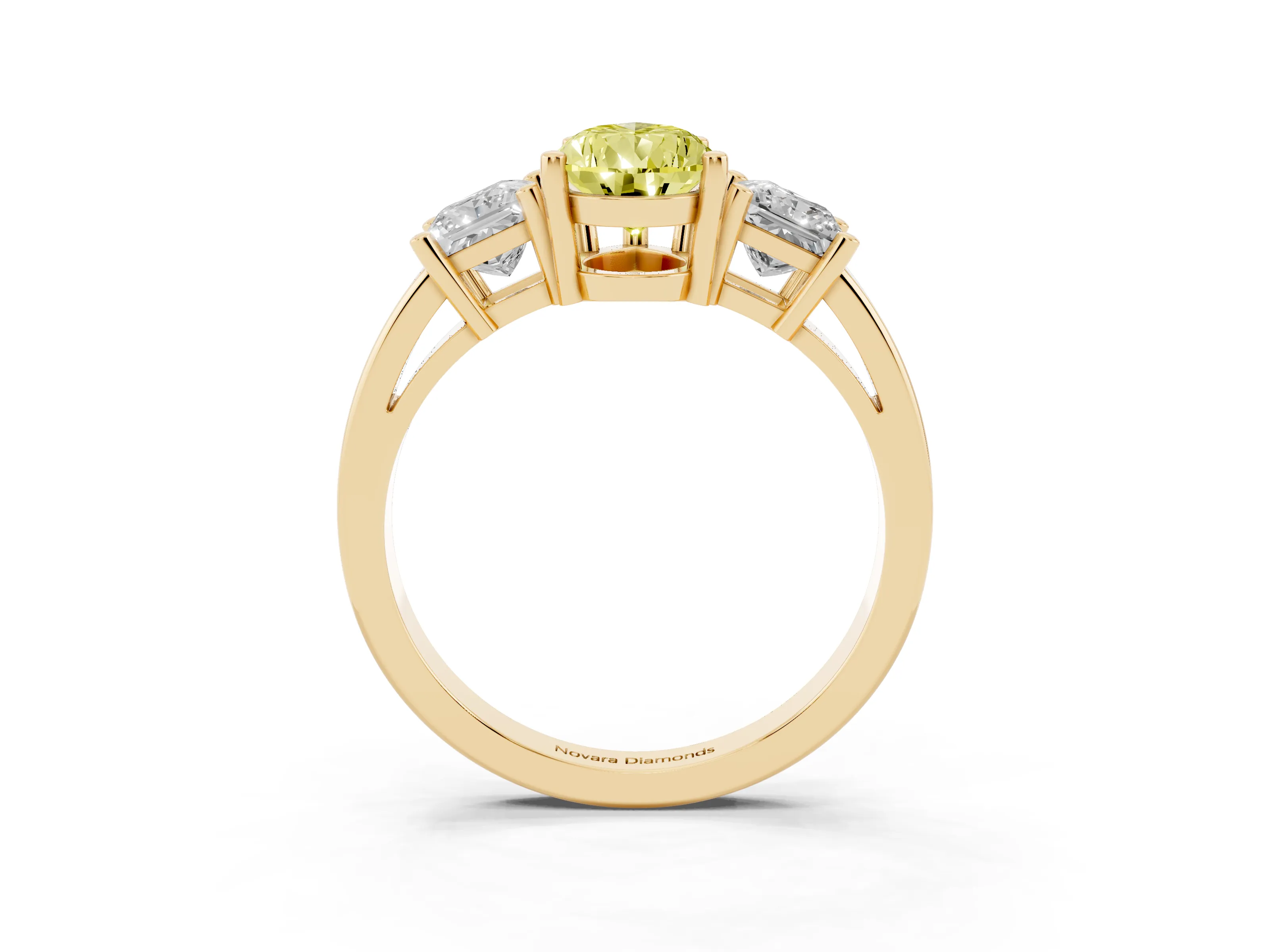 Fancy Yellow Three-Stone Pear Cut Diamond Solitaire Ring Set in Yellow gold with Prong Setting
