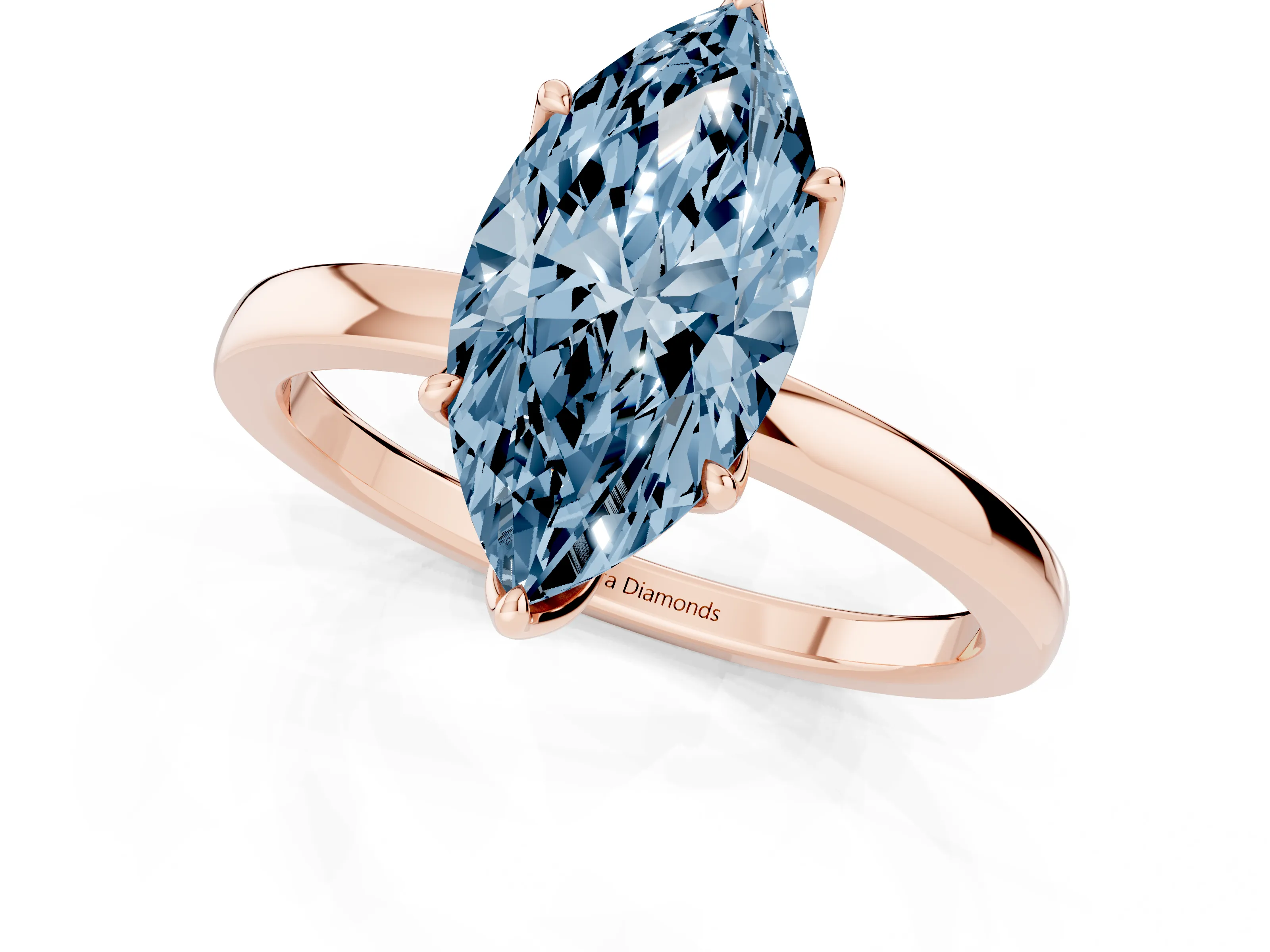 Fancy Blue Marquise Cut Diamond Solitaire Ring Set in Rose gold with Prong Setting and Thin Polished Band