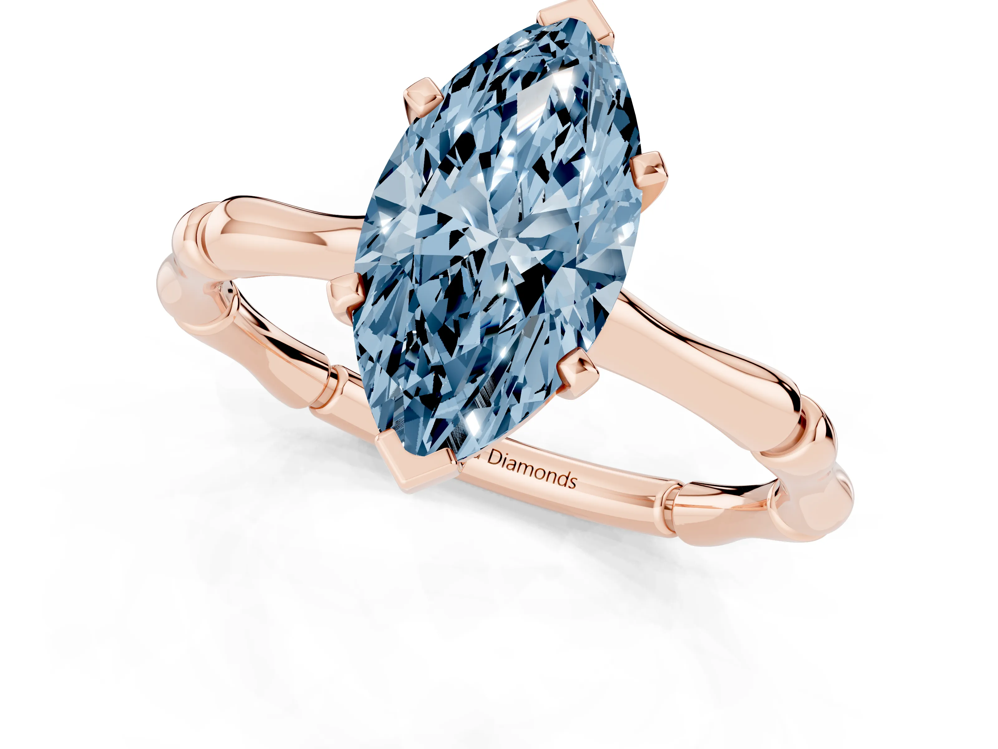 Fancy Blue Marquise Cut Diamond Solitaire Ring Set in Rose gold with Bamboo Band and Prong Setting