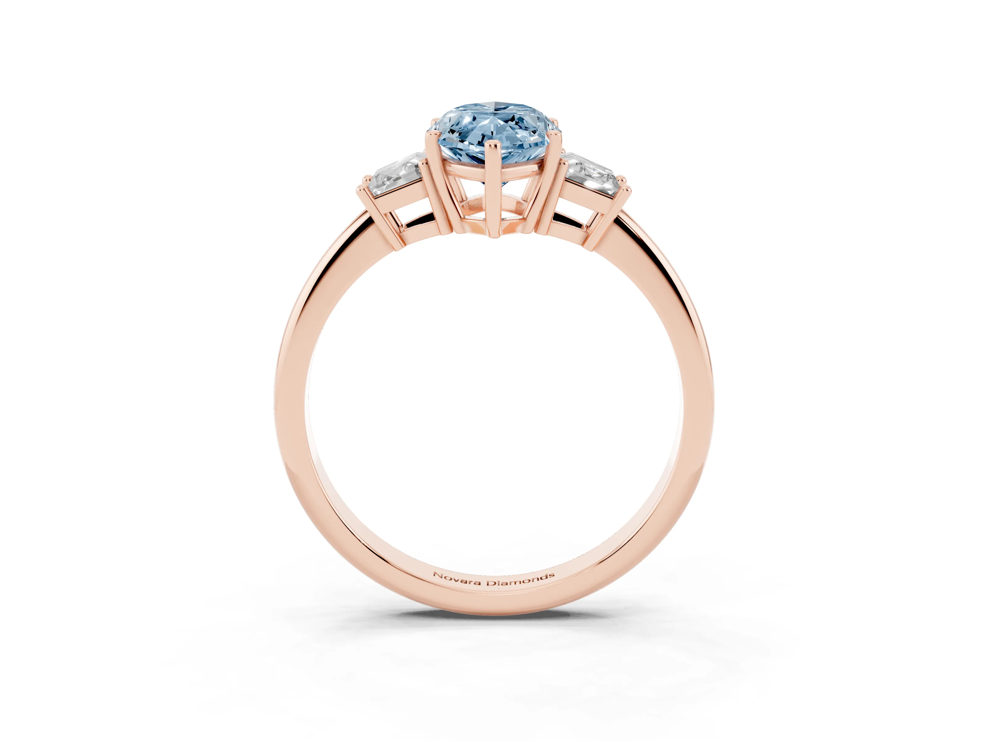 Fancy Blue Marquise Cut Diamond Three-Stone Ring Set in Rose gold with Trapezoid Side Stones and Prong Setting