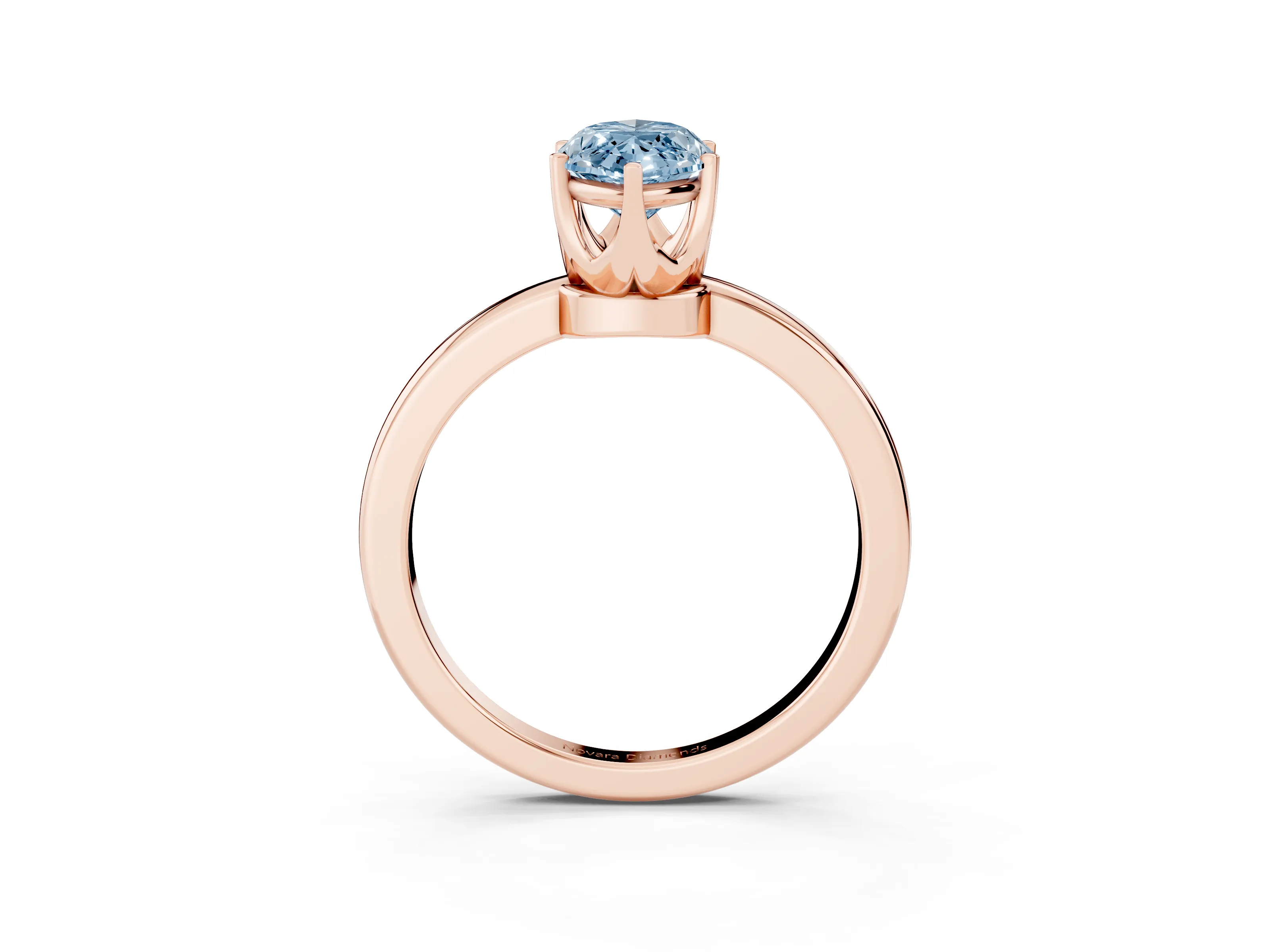 Fancy Blue Marquise Cut Diamond Solitaire Ring Set in Rose gold with Raised Prong Setting on a Classic Band