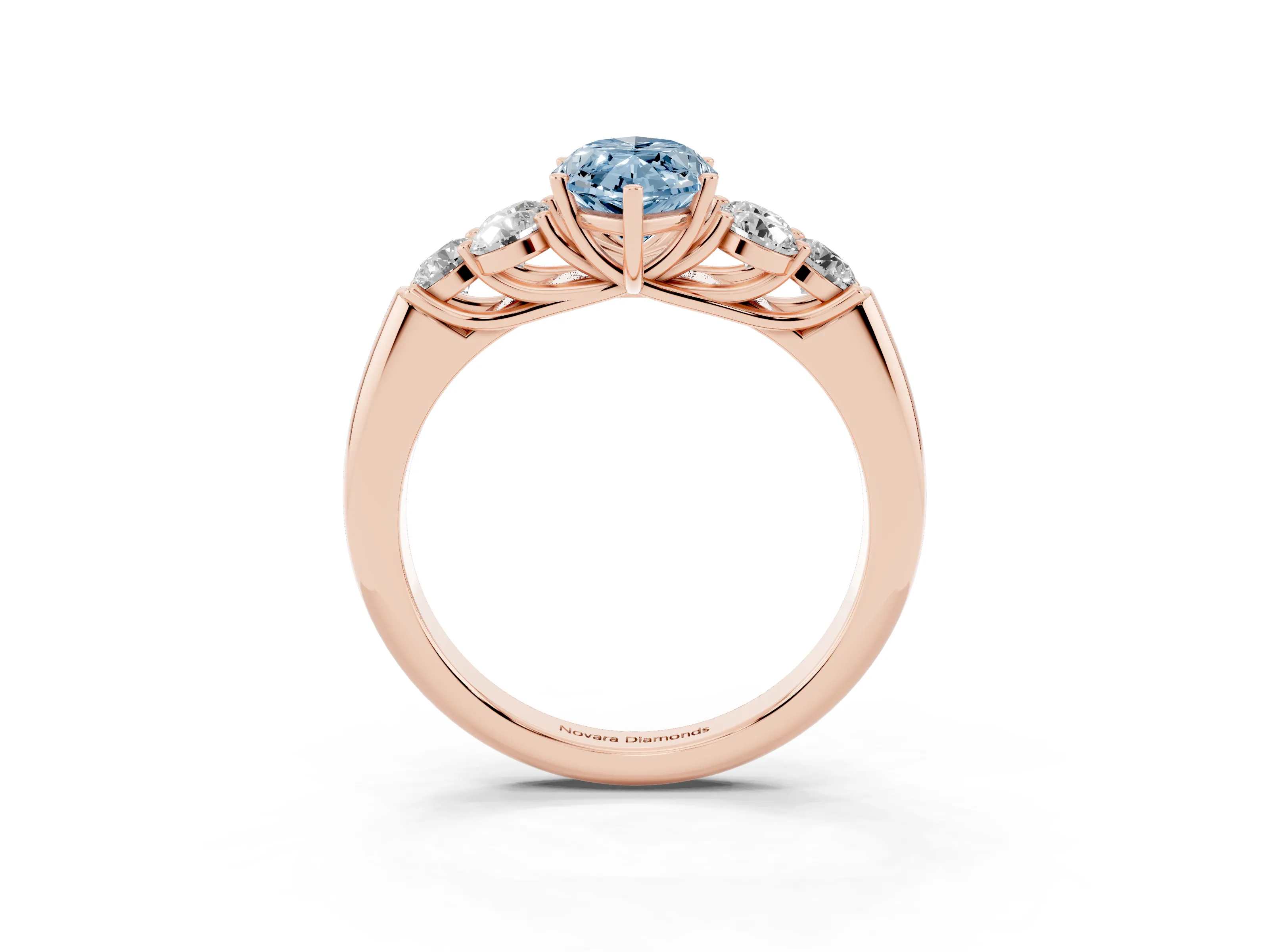Fancy Blue Marquise Cut Diamond Cluster Ring Set in Rose gold with Round Accent Stones and Prong Setting on a Plain Band