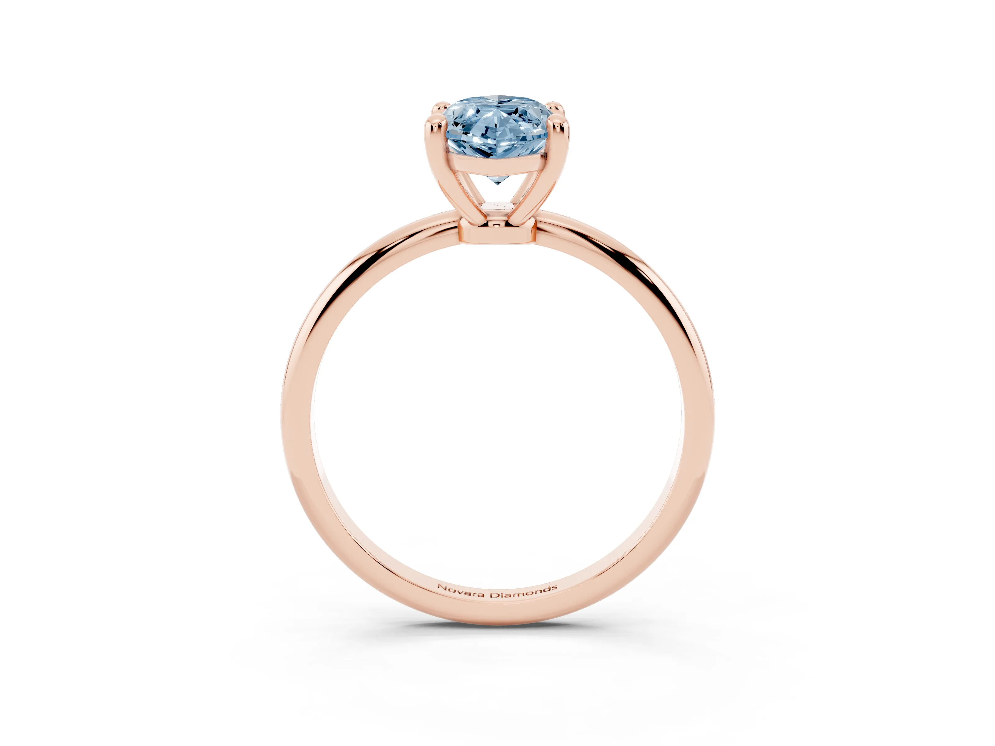 Fancy Blue Marquise Cut Diamond Solitaire Ring Set in Rose gold with Secure Prong Setting on a Classic Band