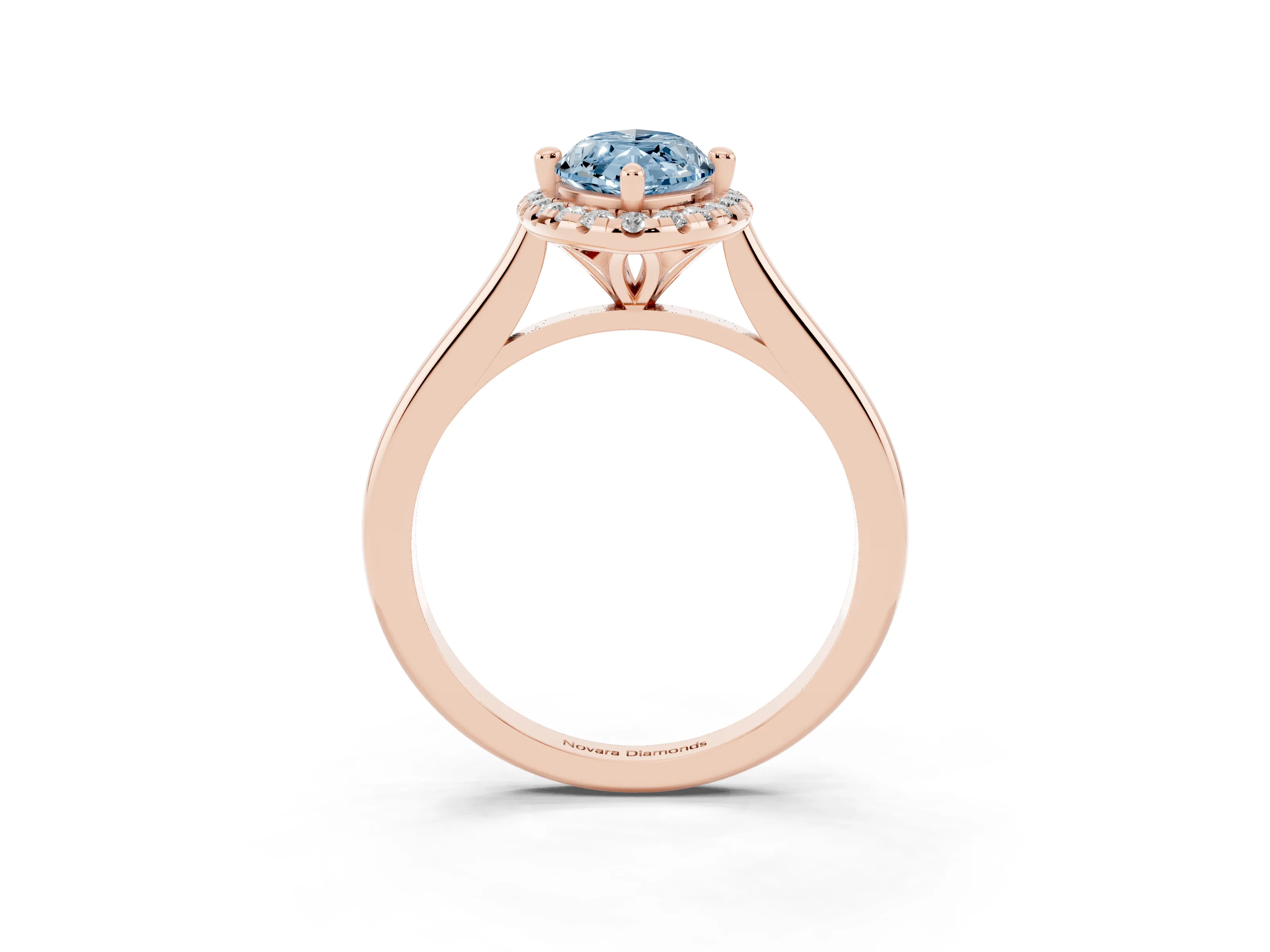 Fancy Blue Marquise Cut Diamond Halo Engagement Ring Set in Rose gold with Pavé Band and Rising Shoulders