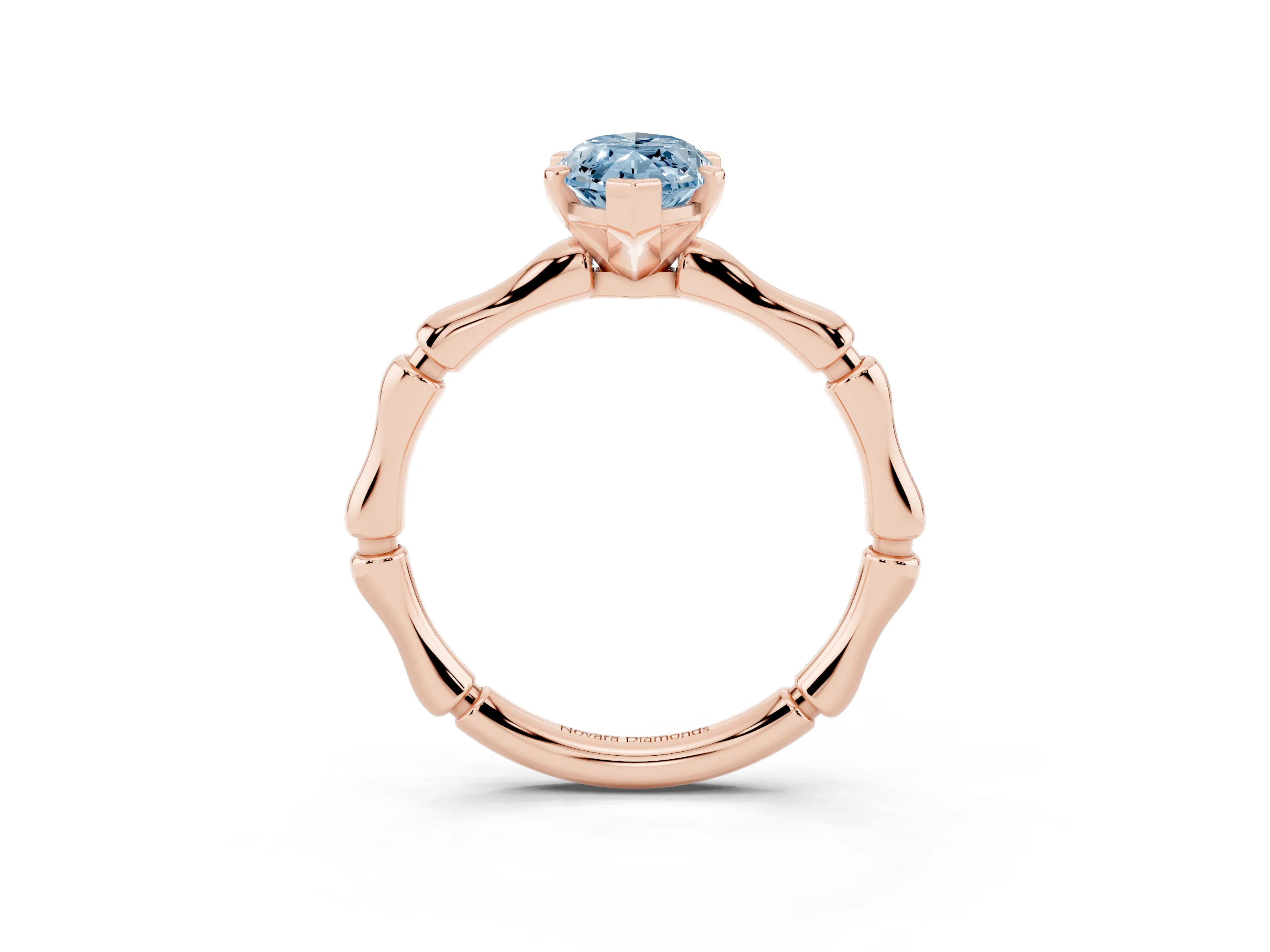 Fancy Blue Marquise Cut Diamond Solitaire Ring Set in Rose gold with Bamboo Band and Prong Setting