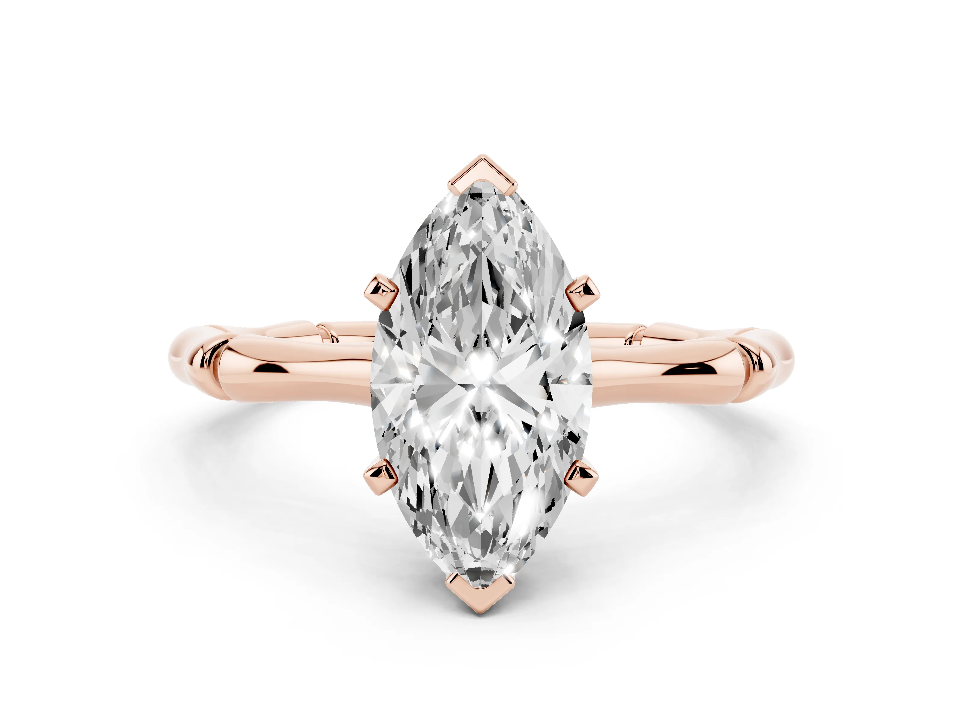 Marquise Cut Diamond Solitaire Ring Set in Rose gold with Bamboo Band and Prong Setting