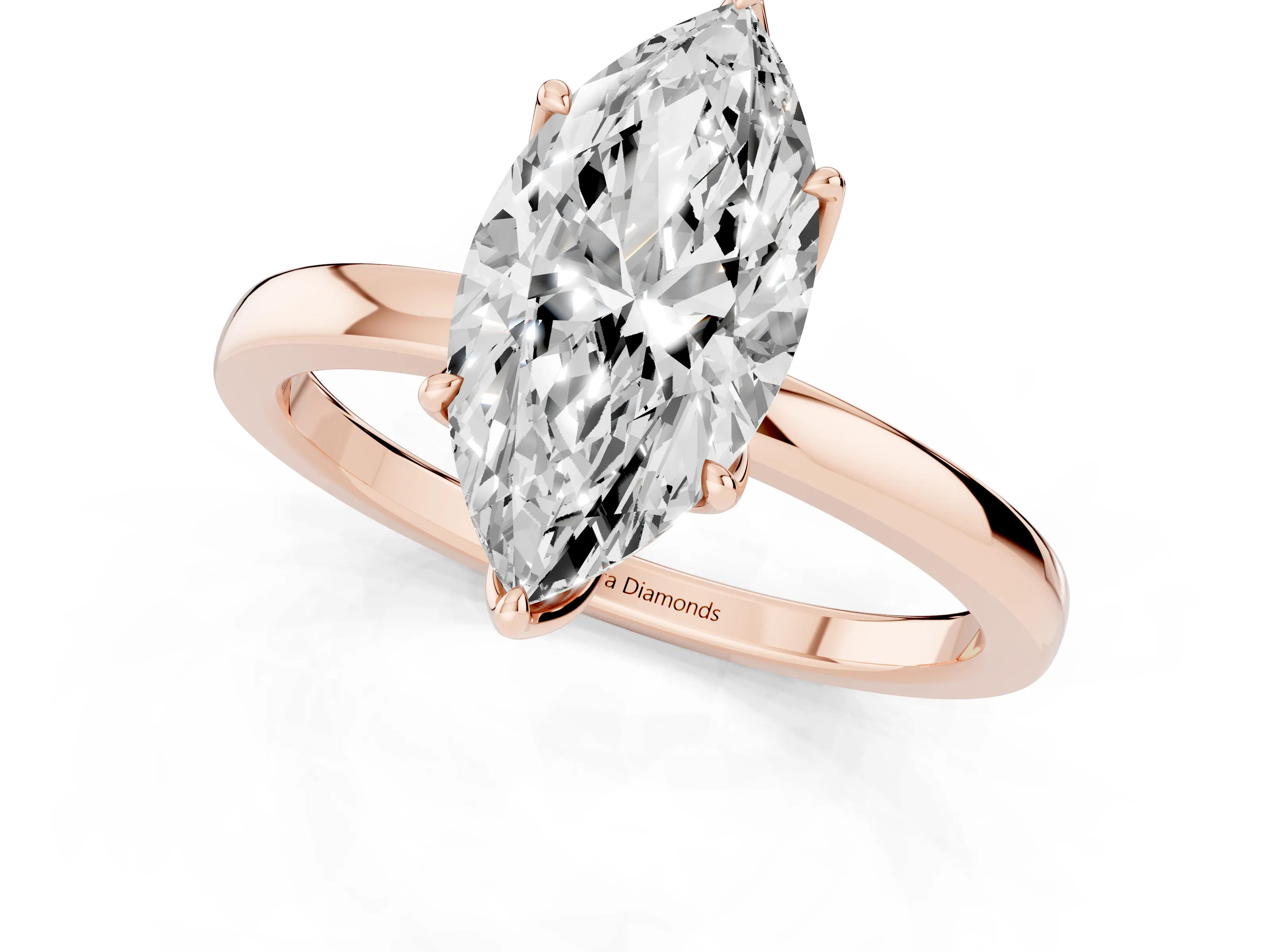 Marquise Cut Diamond Solitaire Ring Set in Rose gold with Prong Setting and Thin Polished Band