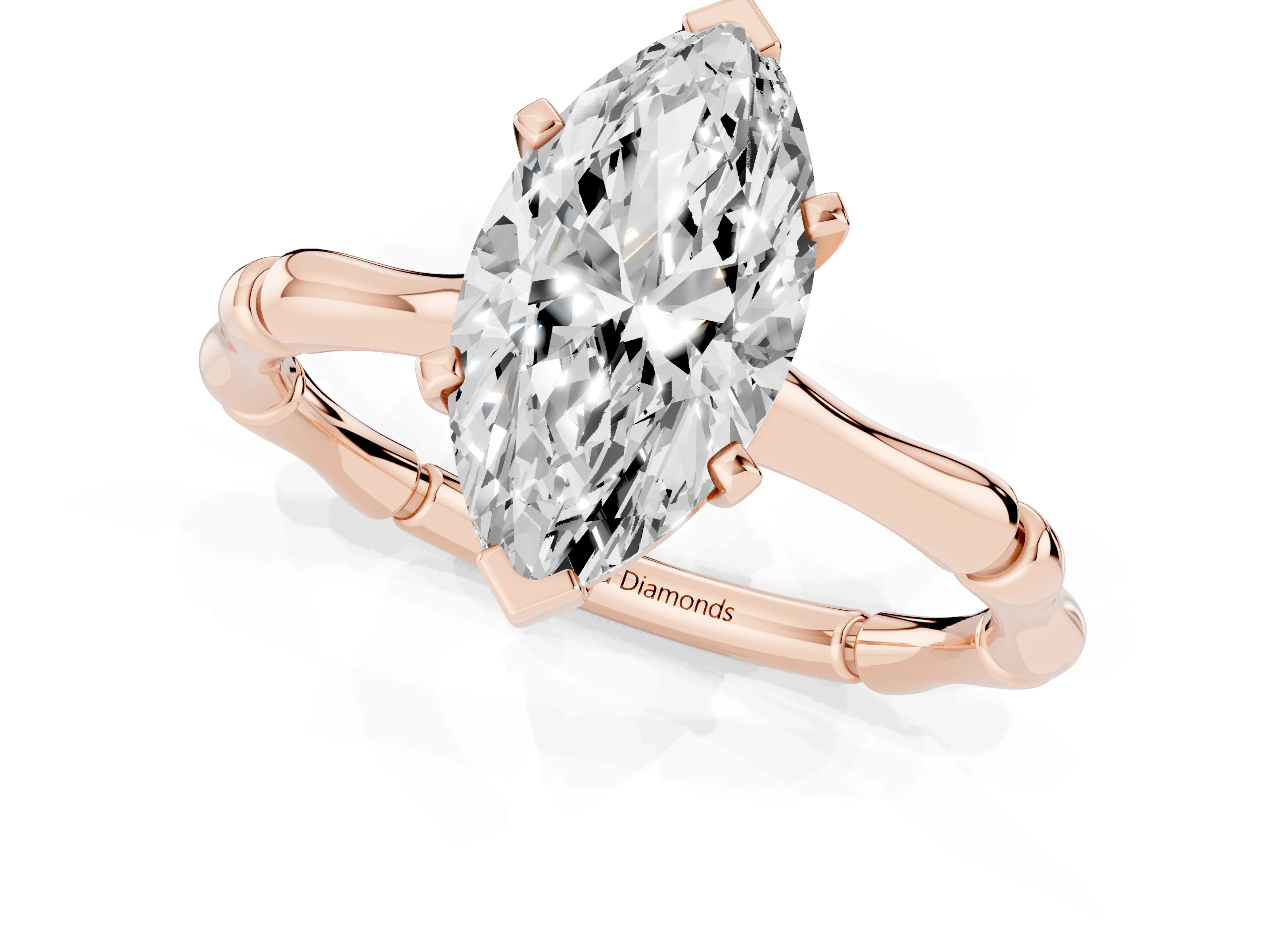 Marquise Cut Diamond Solitaire Ring Set in Rose gold with Bamboo Band and Prong Setting