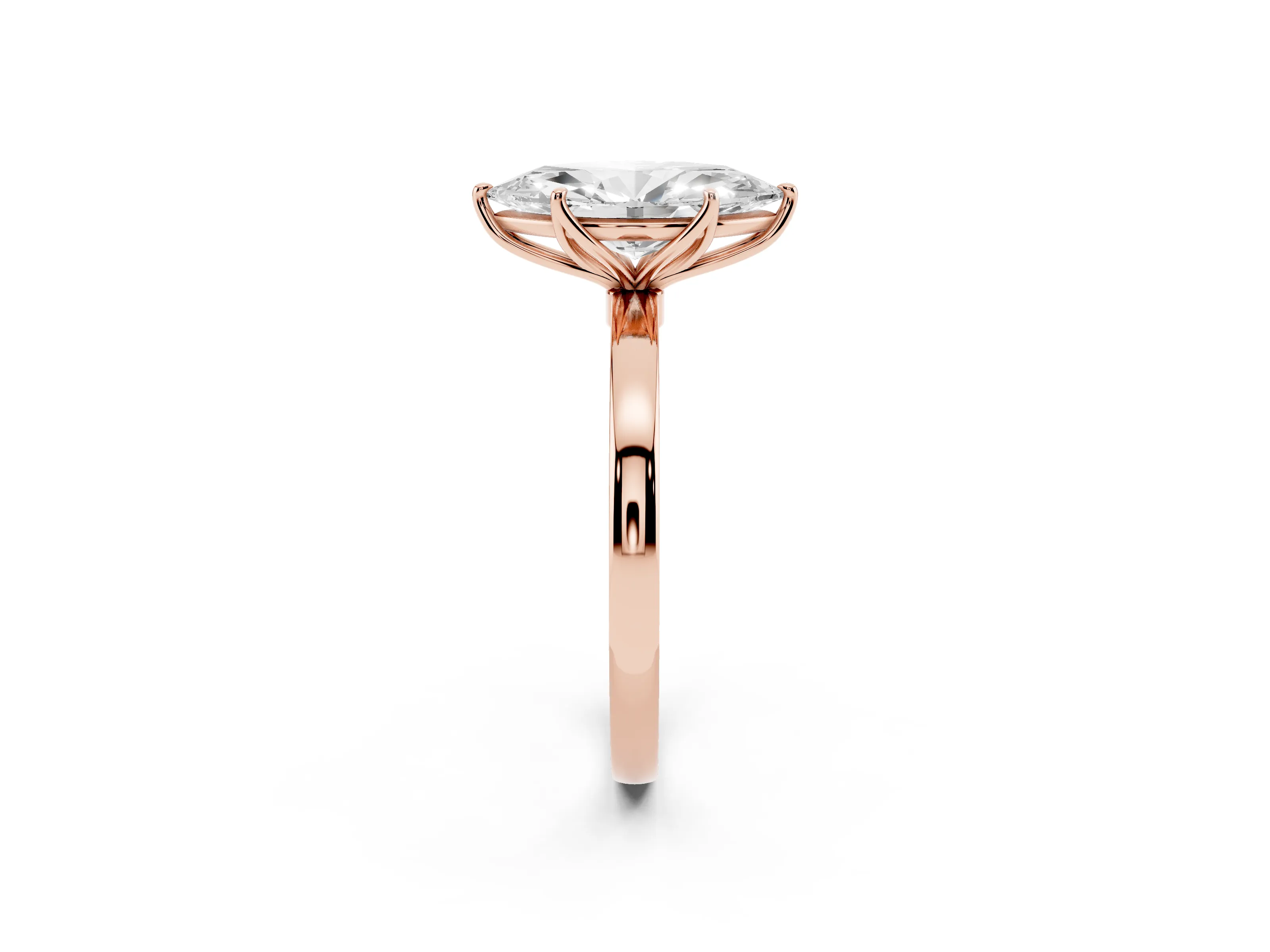 Marquise Cut Diamond Solitaire Ring Set in Rose gold with Prong Setting and Thin Polished Band