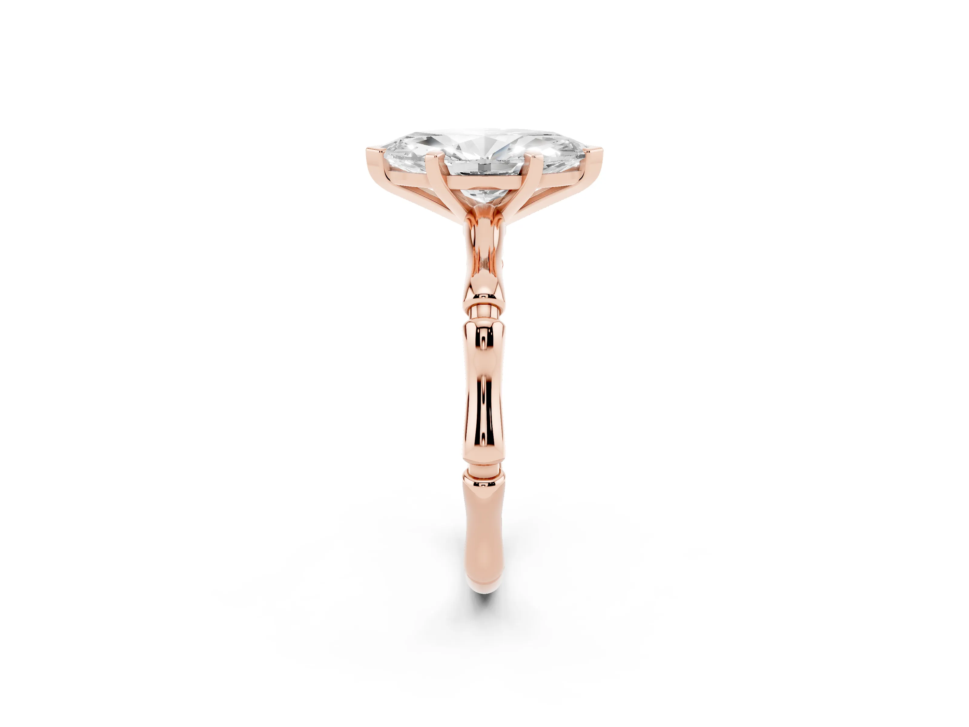 Marquise Cut Diamond Solitaire Ring Set in Rose gold with Bamboo Band and Prong Setting