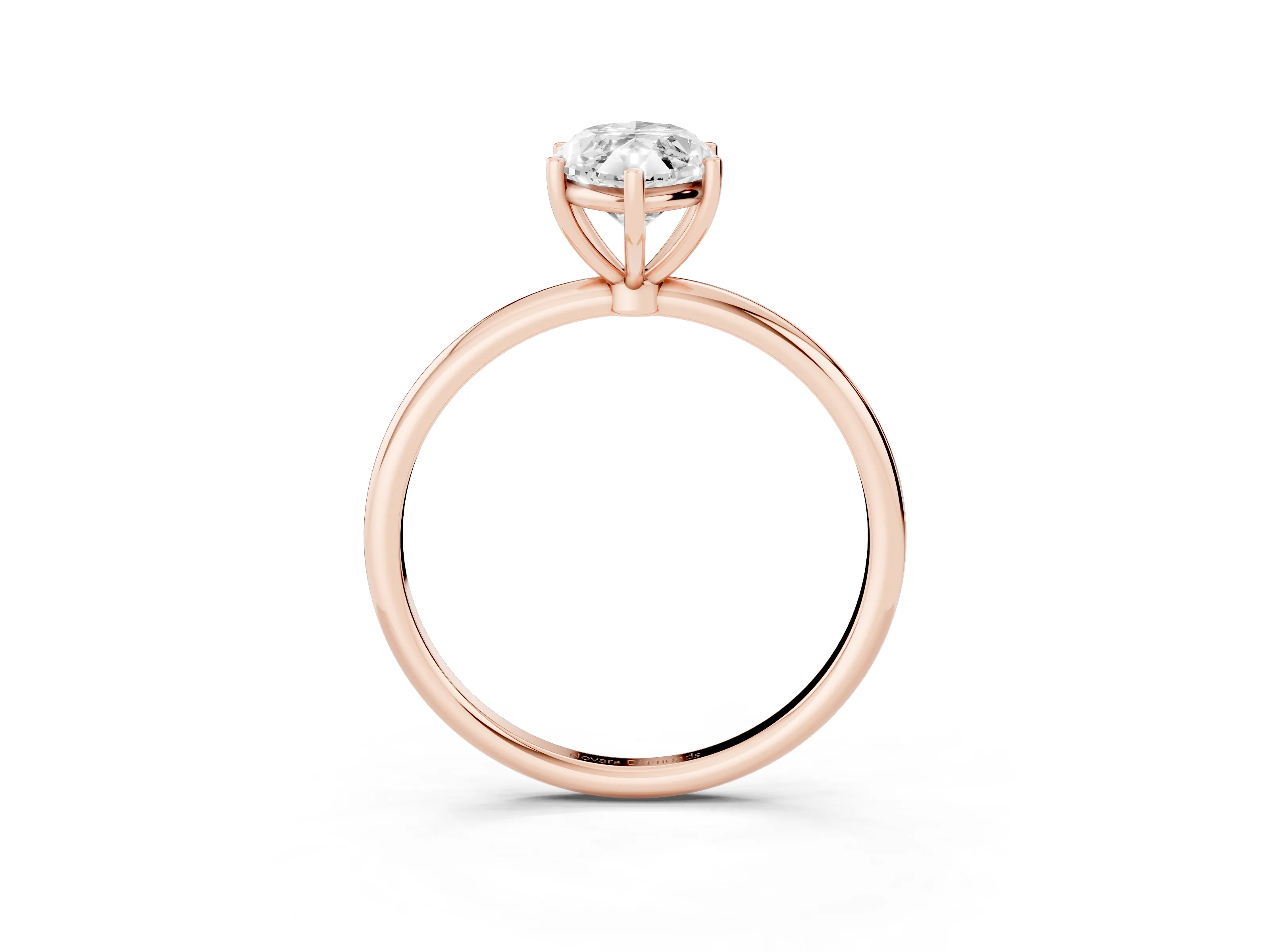 Marquise Cut Diamond Solitaire Engagement Ring Set in Rose gold with Thin Band and Prong Setting
