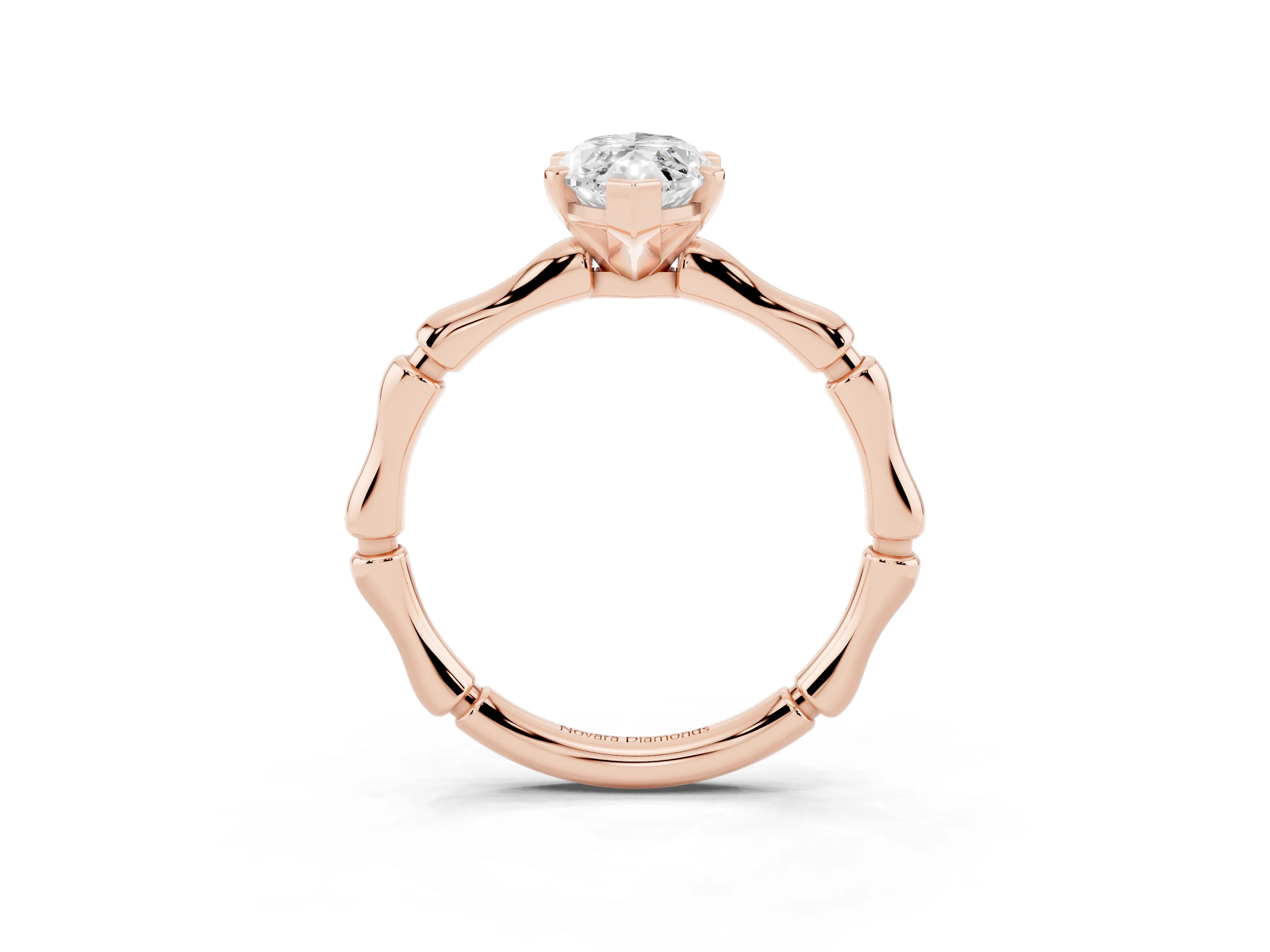 Marquise Cut Diamond Solitaire Ring Set in Rose gold with Bamboo Band and Prong Setting