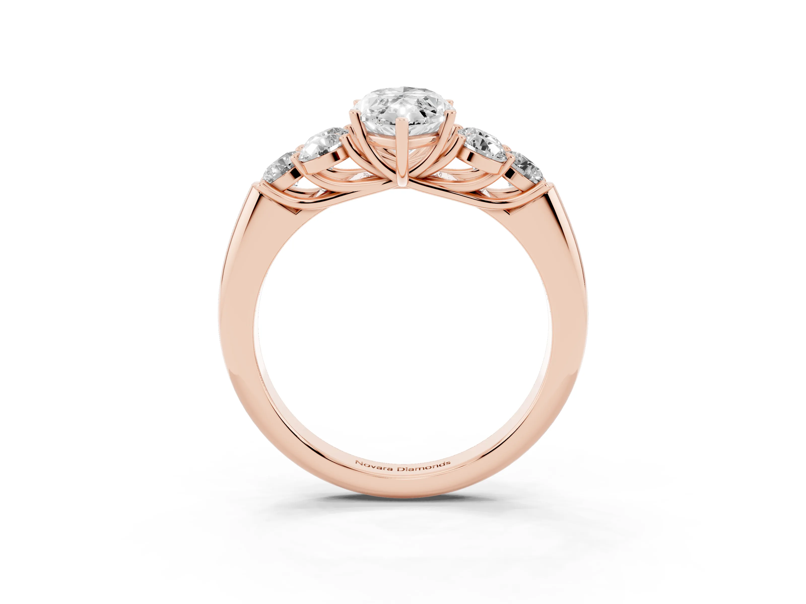 Marquise Cut Diamond Cluster Ring Set in Rose gold with Round Accent Stones and Prong Setting on a Plain Band