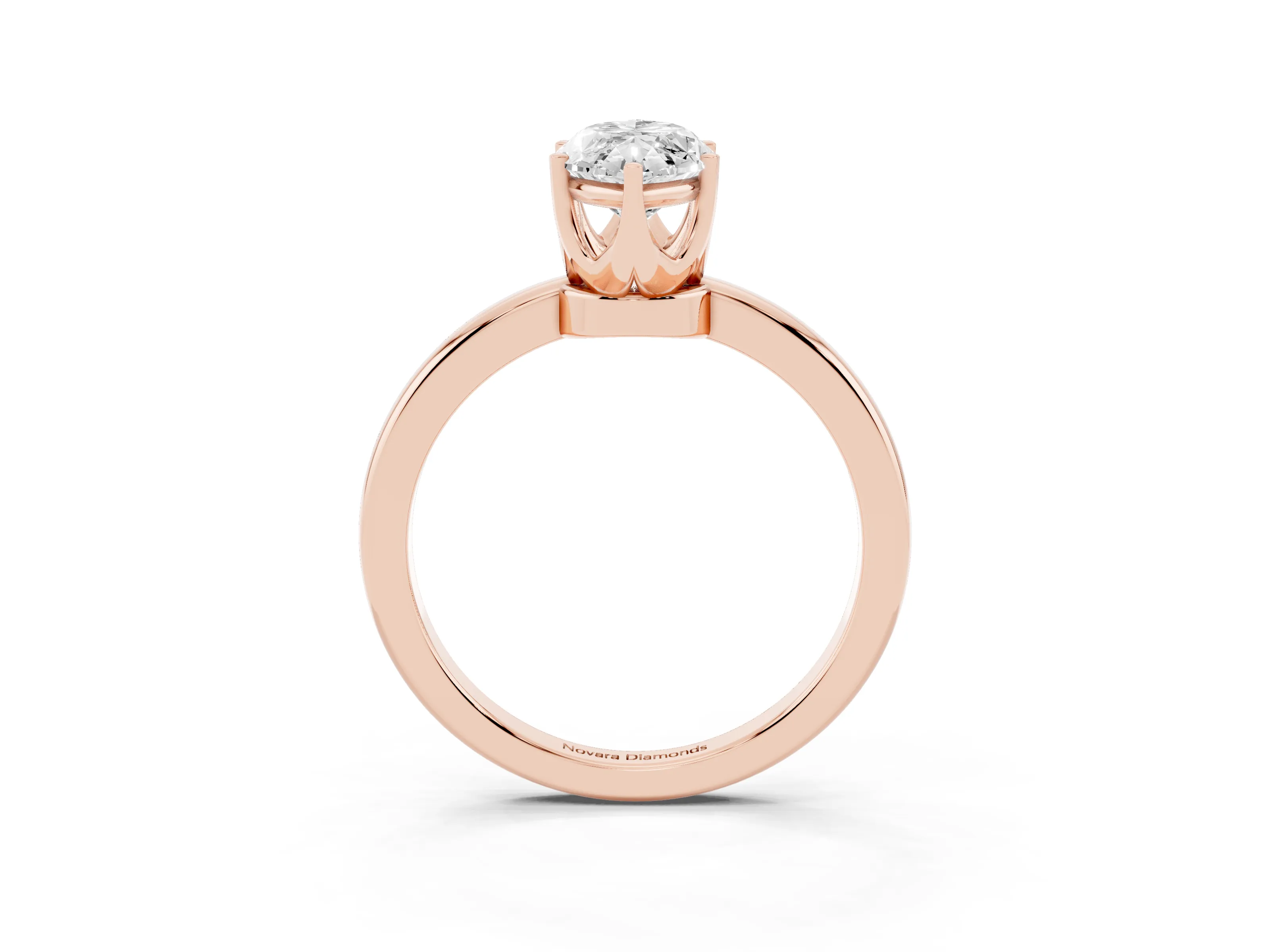 Marquise Cut Diamond Solitaire Ring Set in Rose gold with Raised Prong Setting on a Classic Band