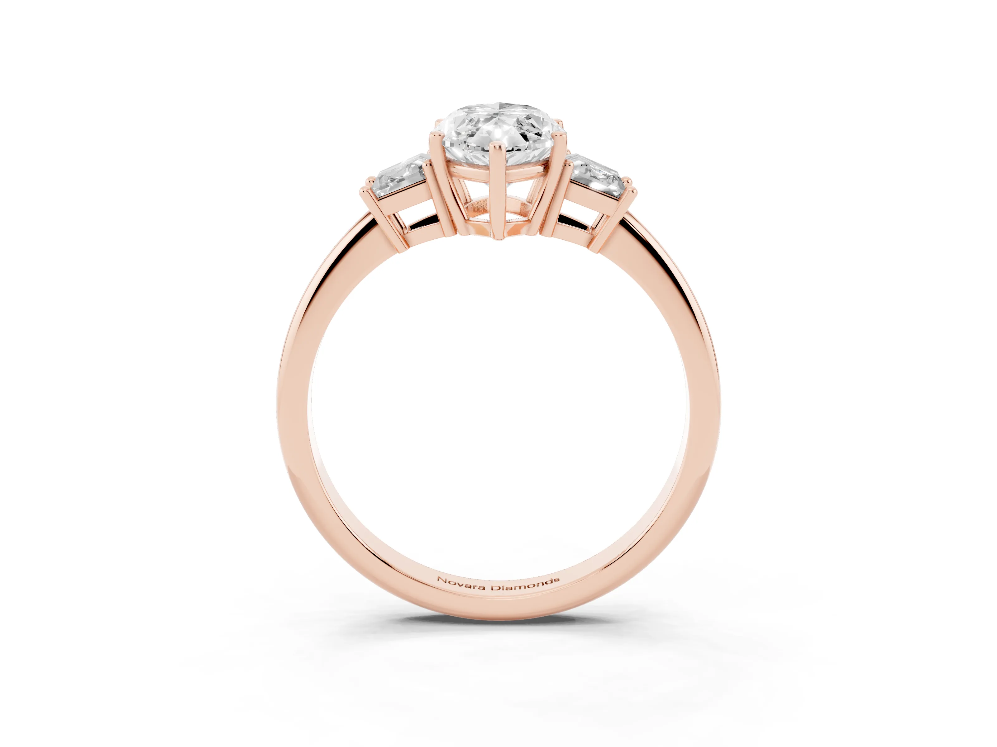 Marquise Cut Diamond Three-Stone Ring Set in Rose gold with Trapezoid Side Stones and Prong Setting