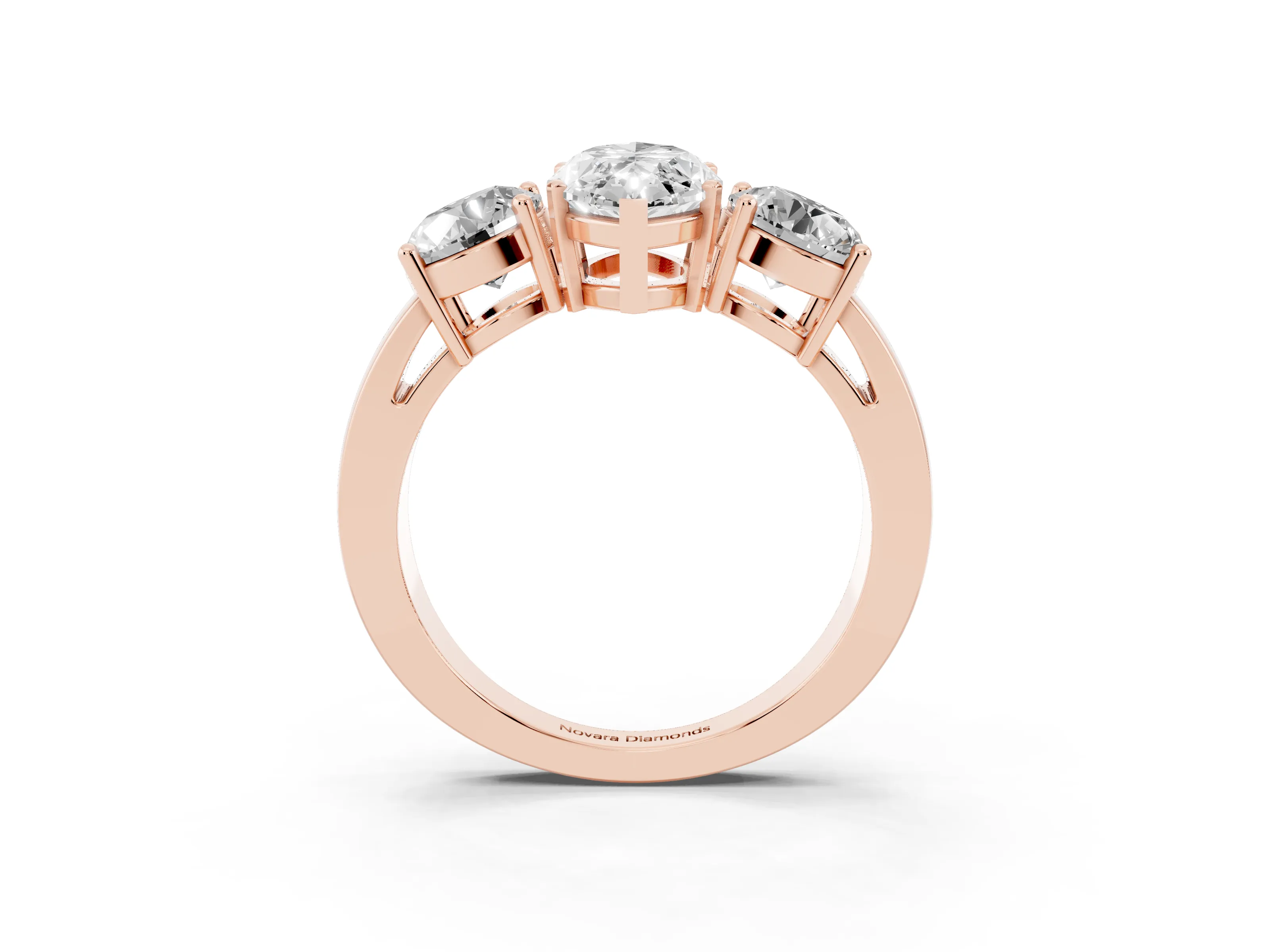 Marquise Cut Diamond Three-Stone Ring Set in Rose gold with Round Side Stones and Classic Band