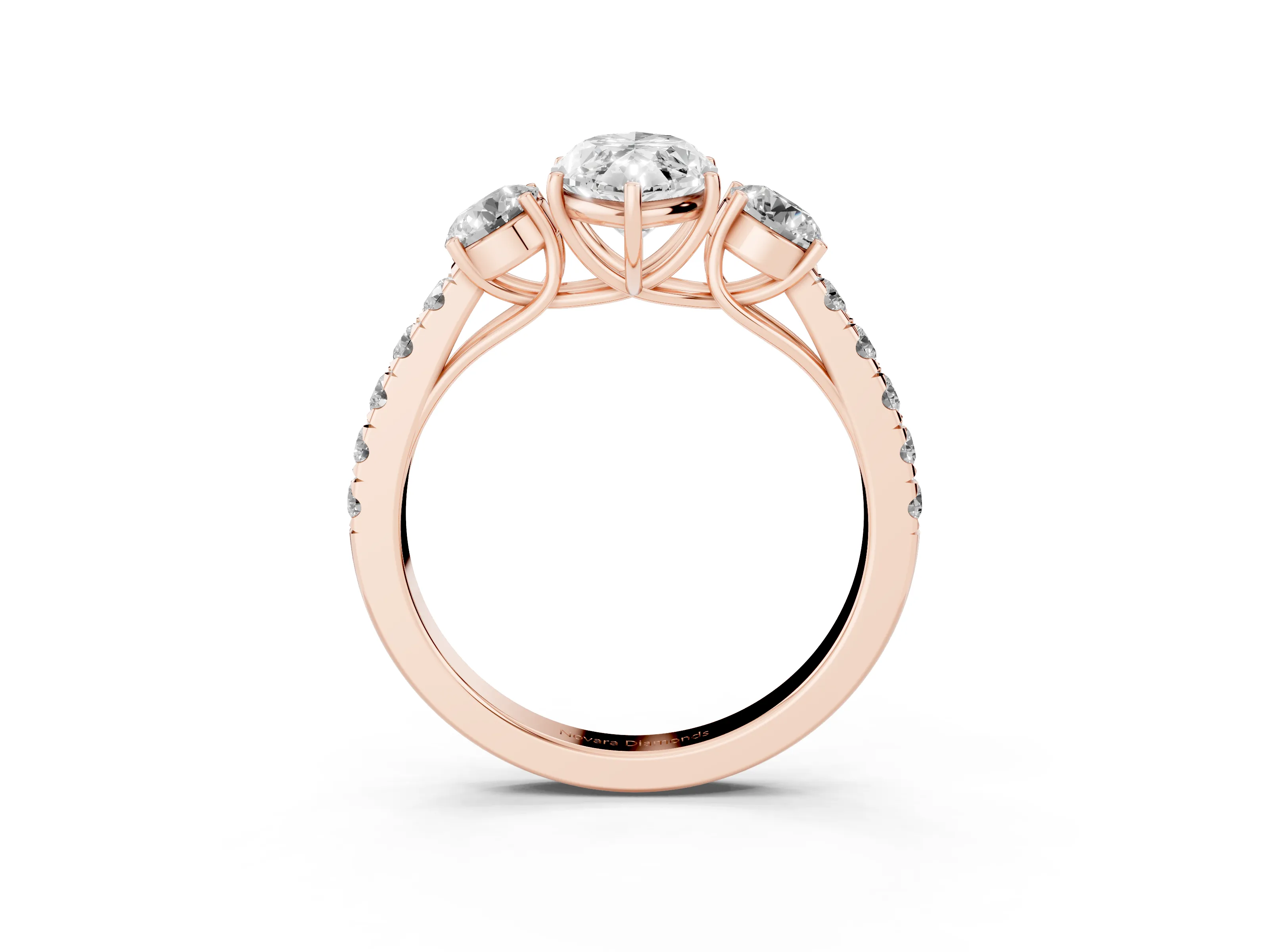 Marquise Cut Diamond Three-Stone Ring Set in Rose gold with Round Side Stones and Delicate Pavé Band