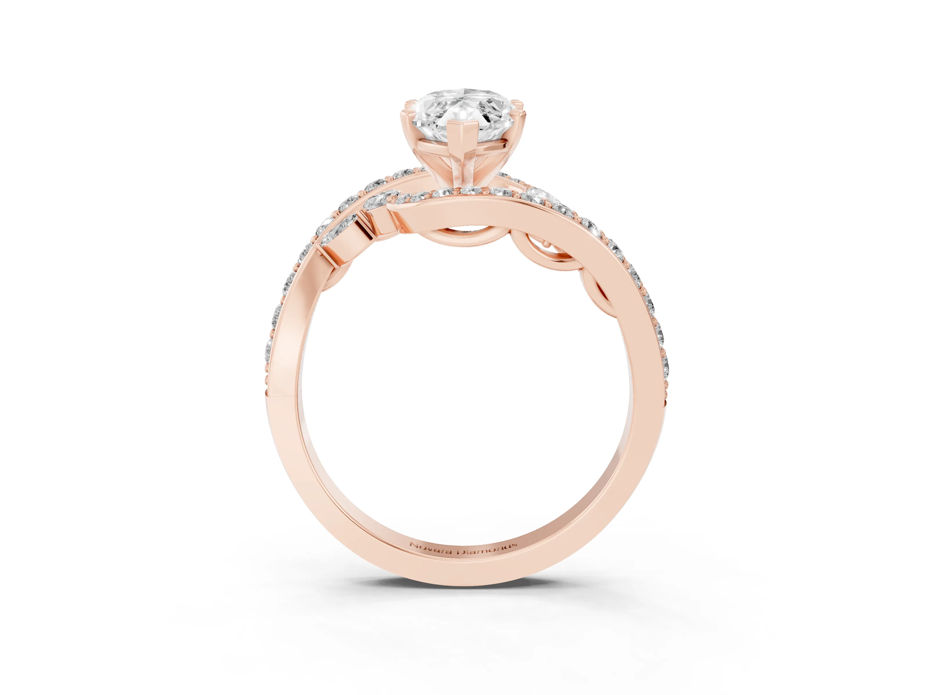 Marquise Cut Diamond Solitaire Ring Set in Rose gold with Pavé Twist Band and Secure Prong Setting