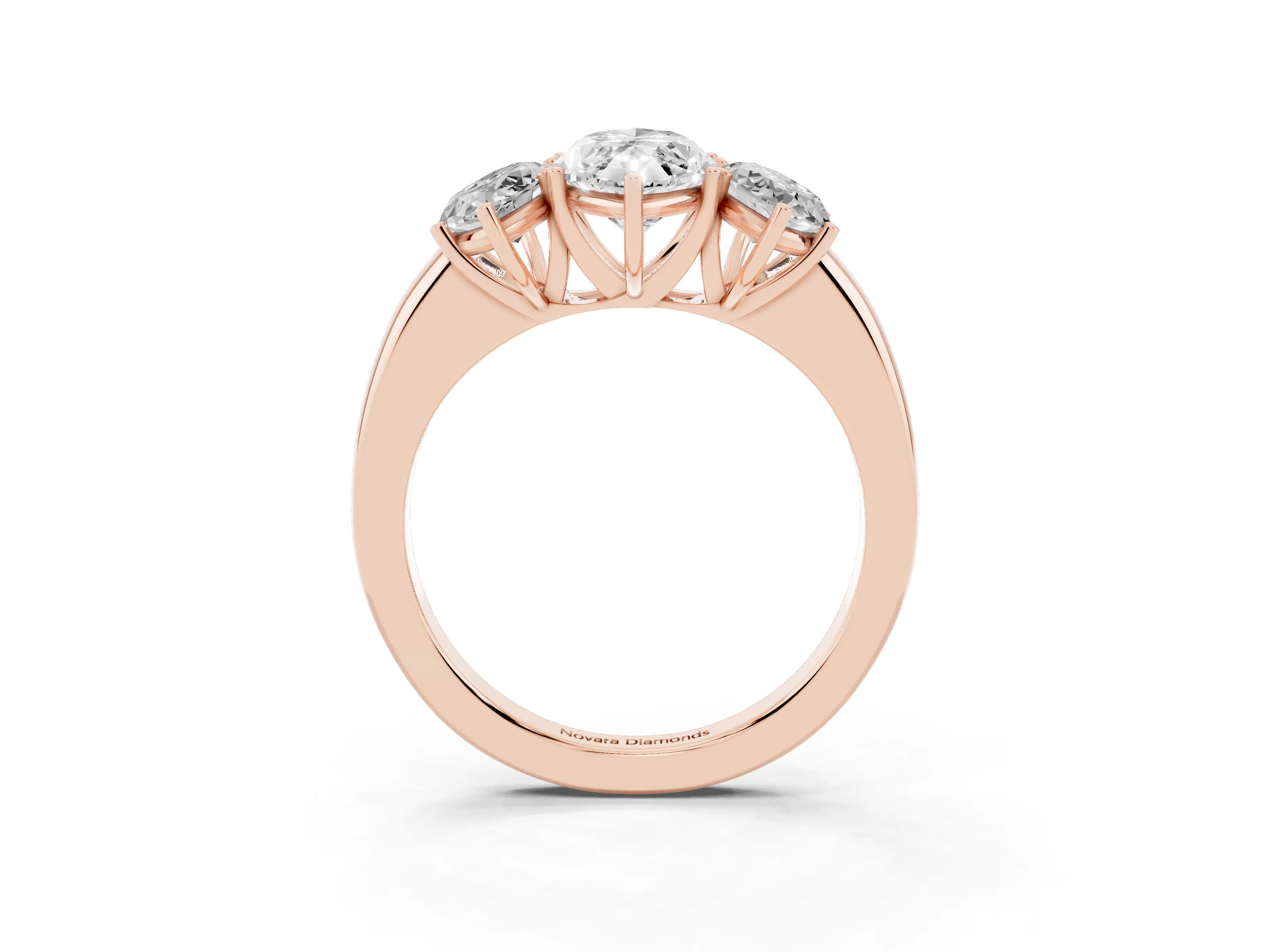 Marquise Cut Diamond Three-Stone Ring Set in Rose gold with Bold Center and Classic Band