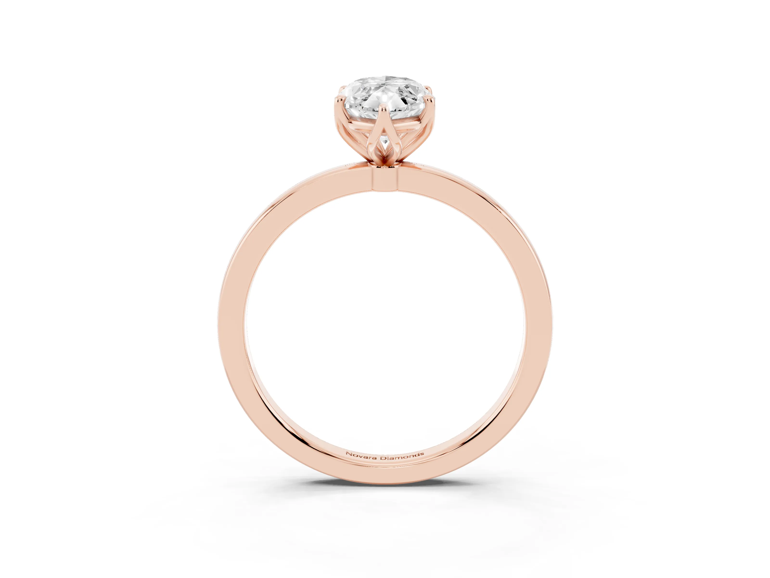 Marquise Cut Diamond Solitaire Ring Set in Rose gold with Prong Setting and Thin Polished Band