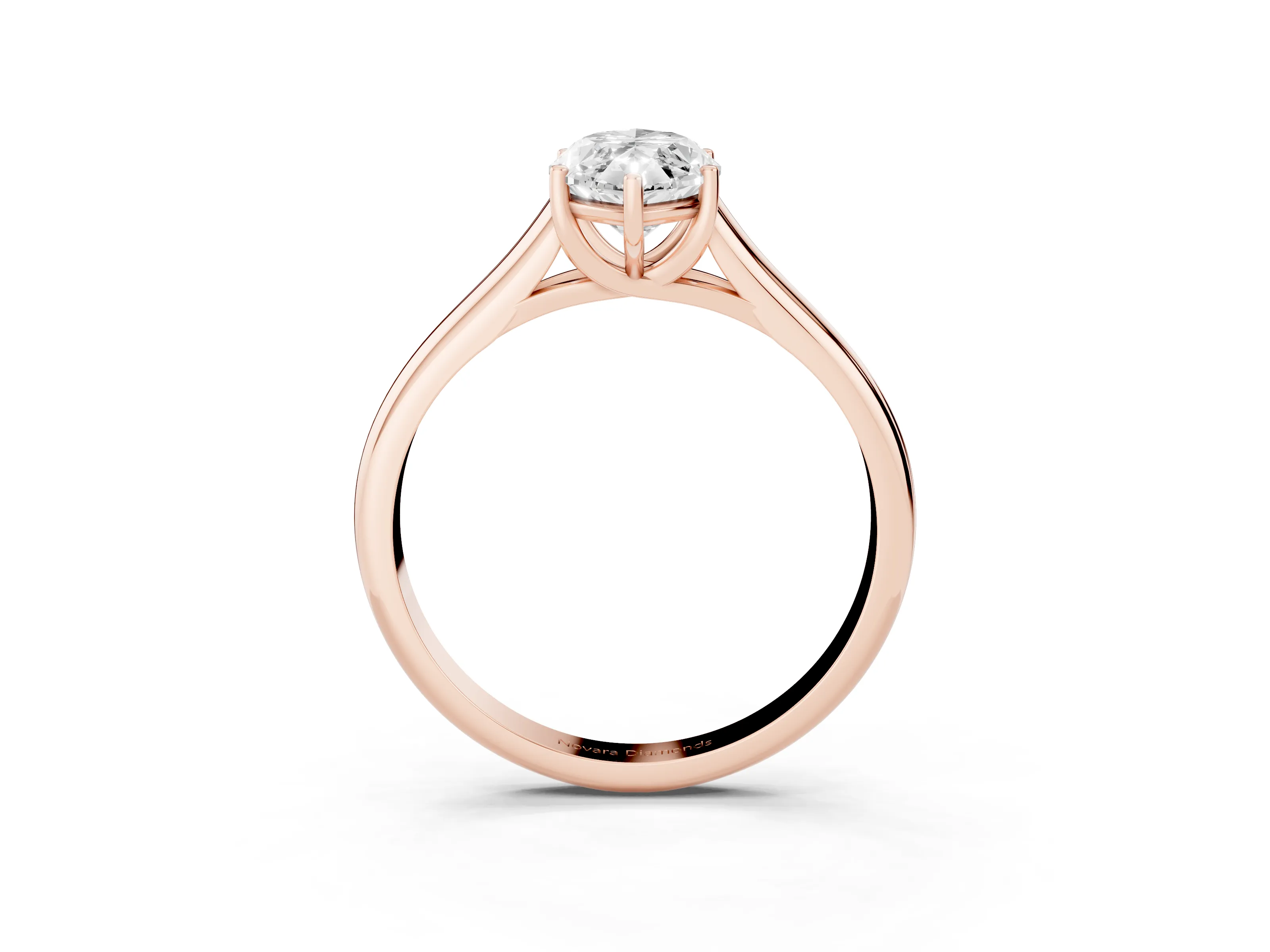 Marquise Cut Diamond Solitaire Engagement Ring Set in Rose gold with Subtly Tapered Band and Prong Setting
