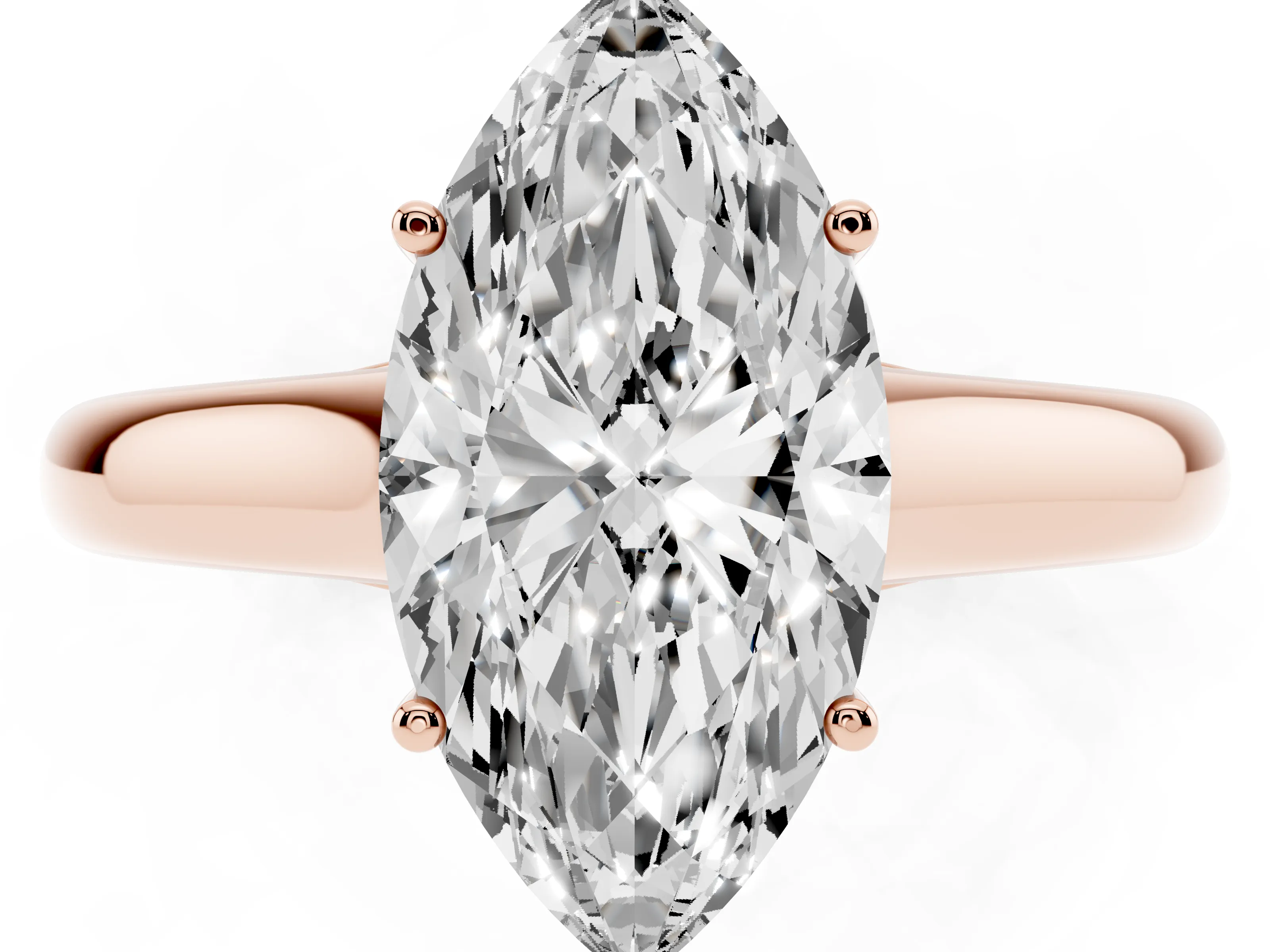 Marquise Cut Diamond Solitaire Engagement Ring Set in Rose gold with Subtly Tapered Band and Prong Setting