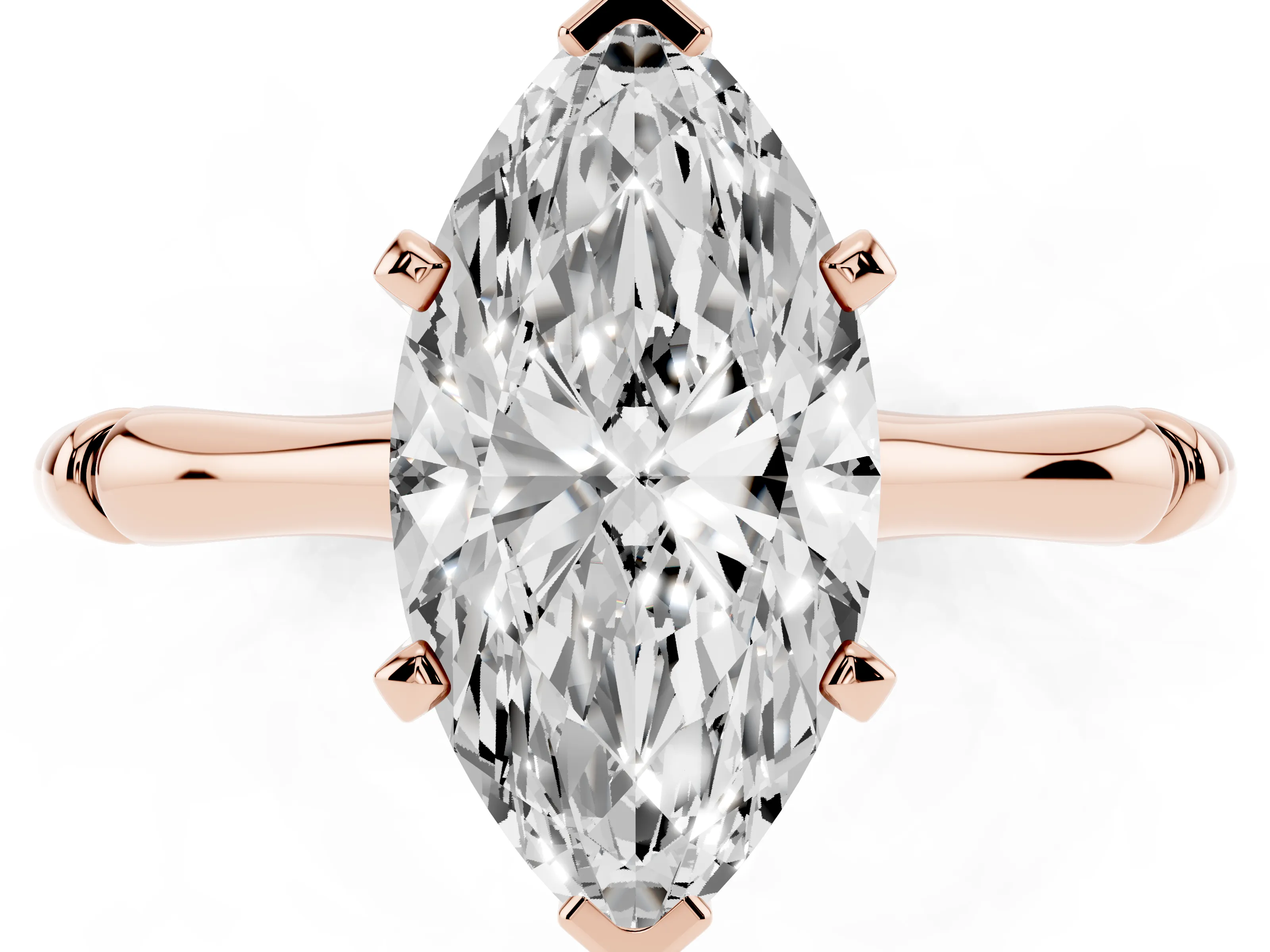 Marquise Cut Diamond Solitaire Ring Set in Rose gold with Bamboo Band and Prong Setting