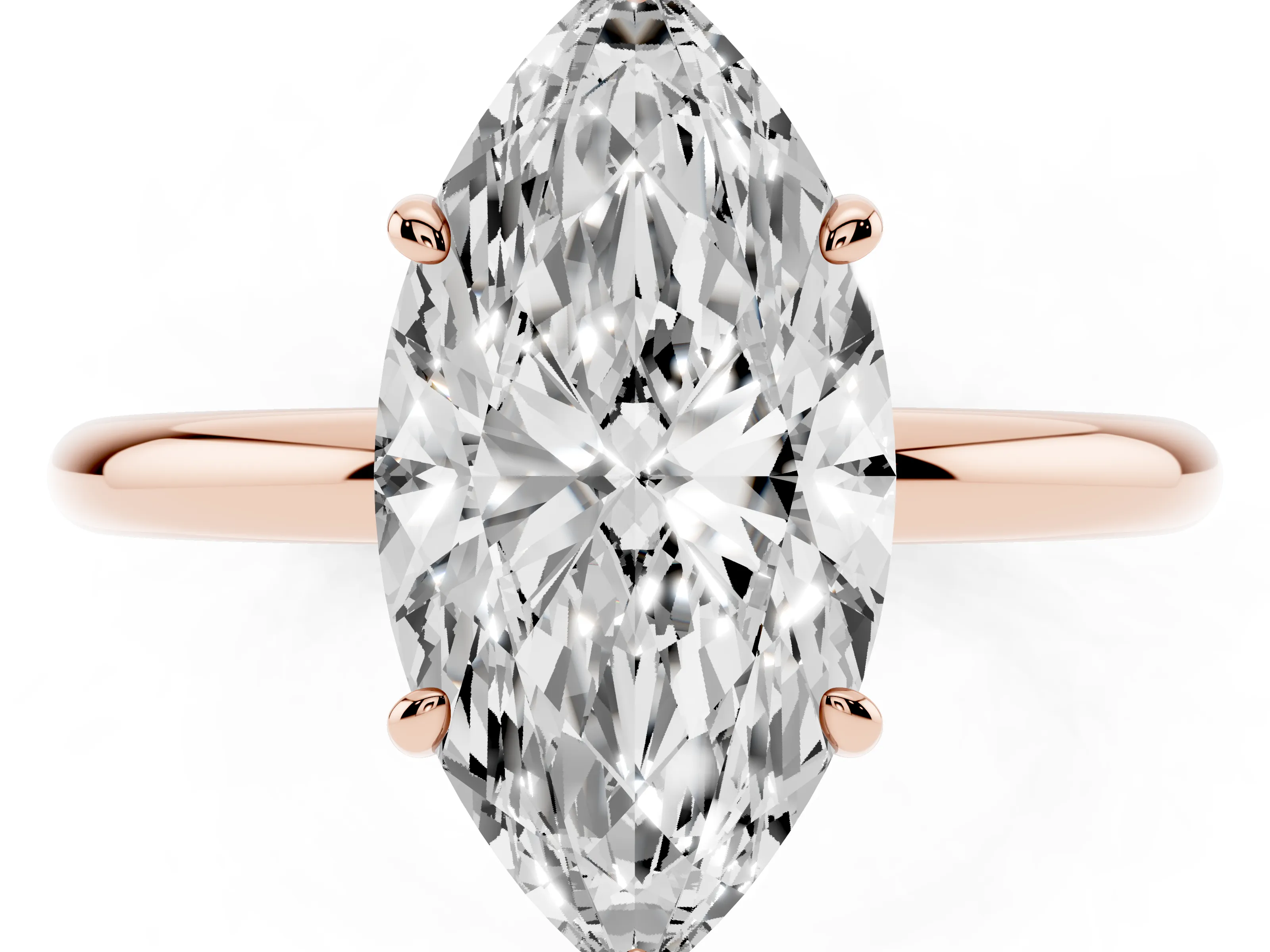 Marquise Cut Diamond Solitaire Ring Set in Rose gold with Prong Setting on a Polished Plain Band