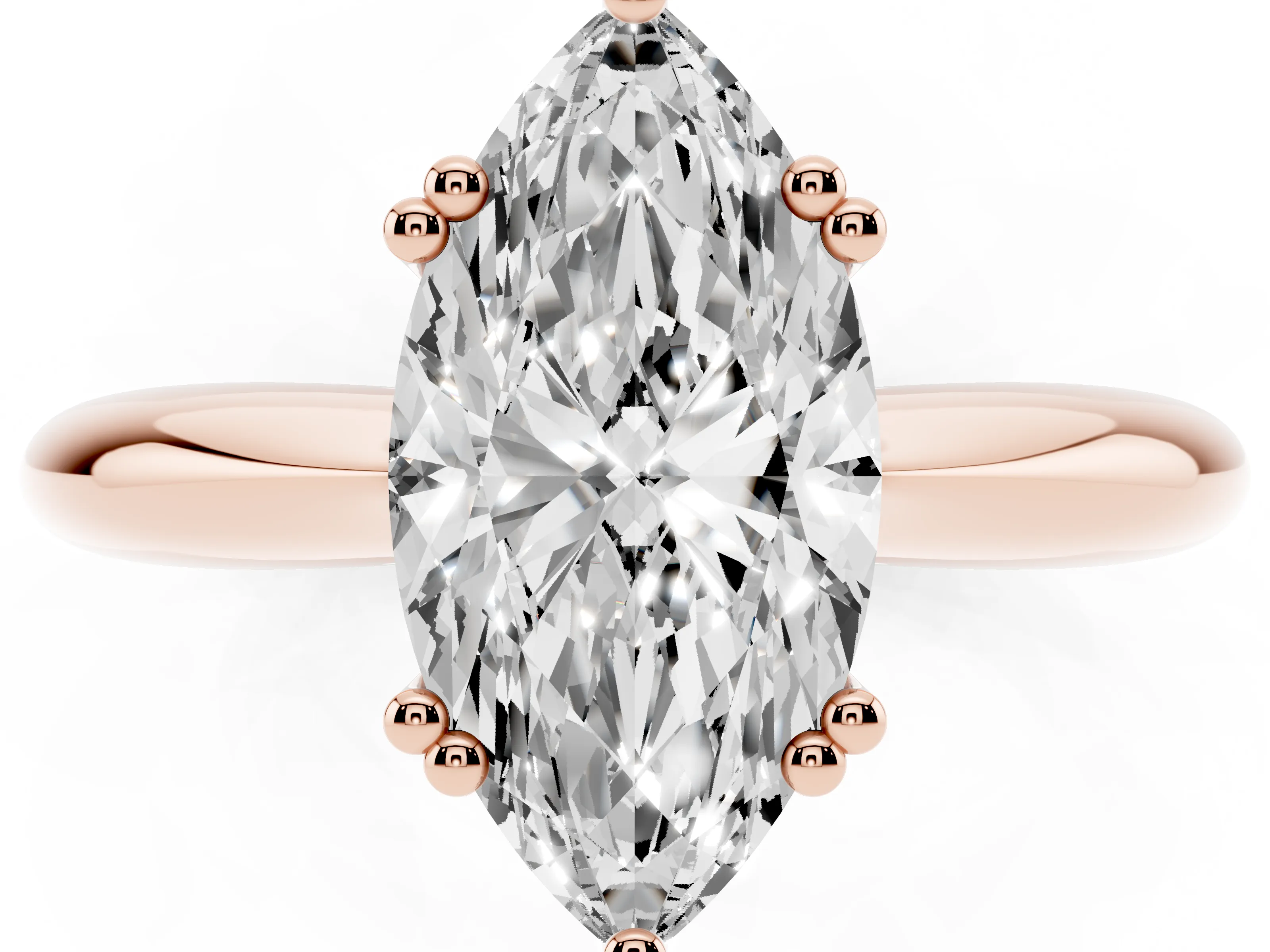 Marquise Cut Diamond Solitaire Engagement Ring Set in Rose gold with Tapered Band and Prong Setting
