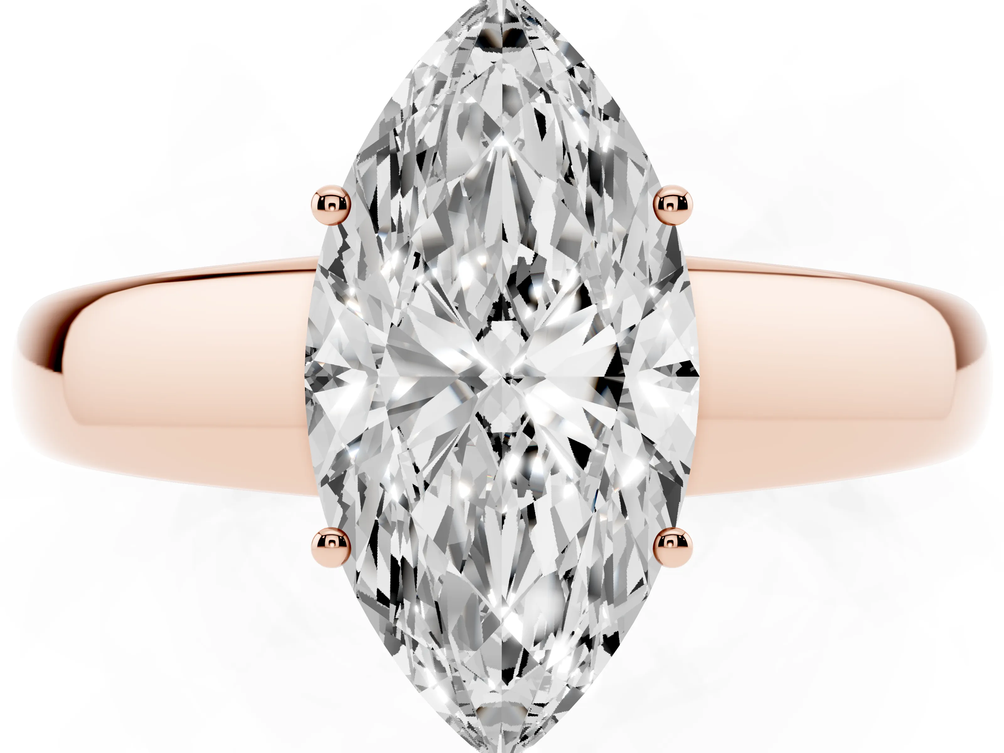 Marquise Cut Diamond Solitaire Ring Set in Rose gold with Tapered Band and Prong Setting