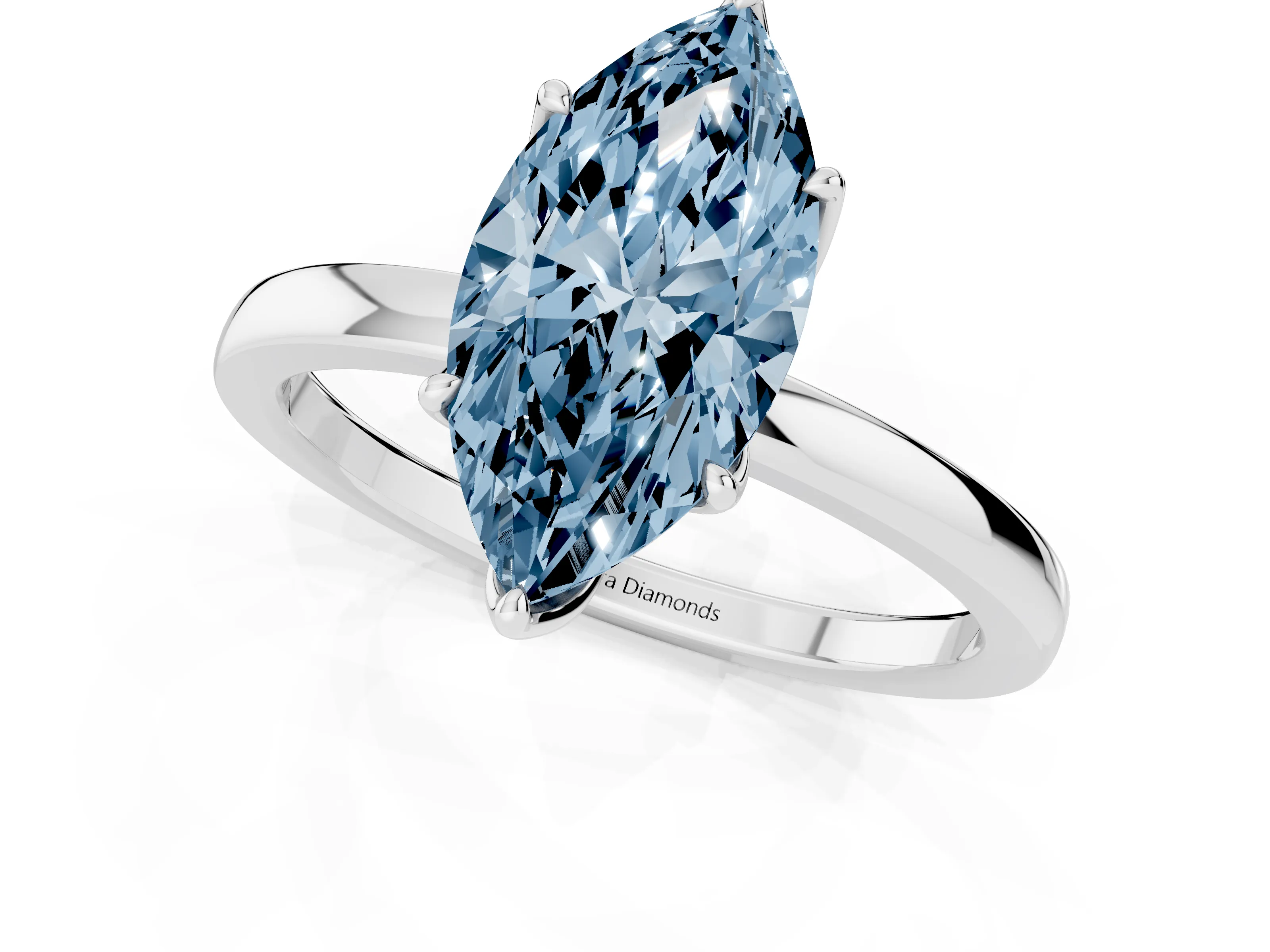 Fancy Blue Marquise Cut Diamond Solitaire Ring Set in White gold with Prong Setting and Thin Polished Band