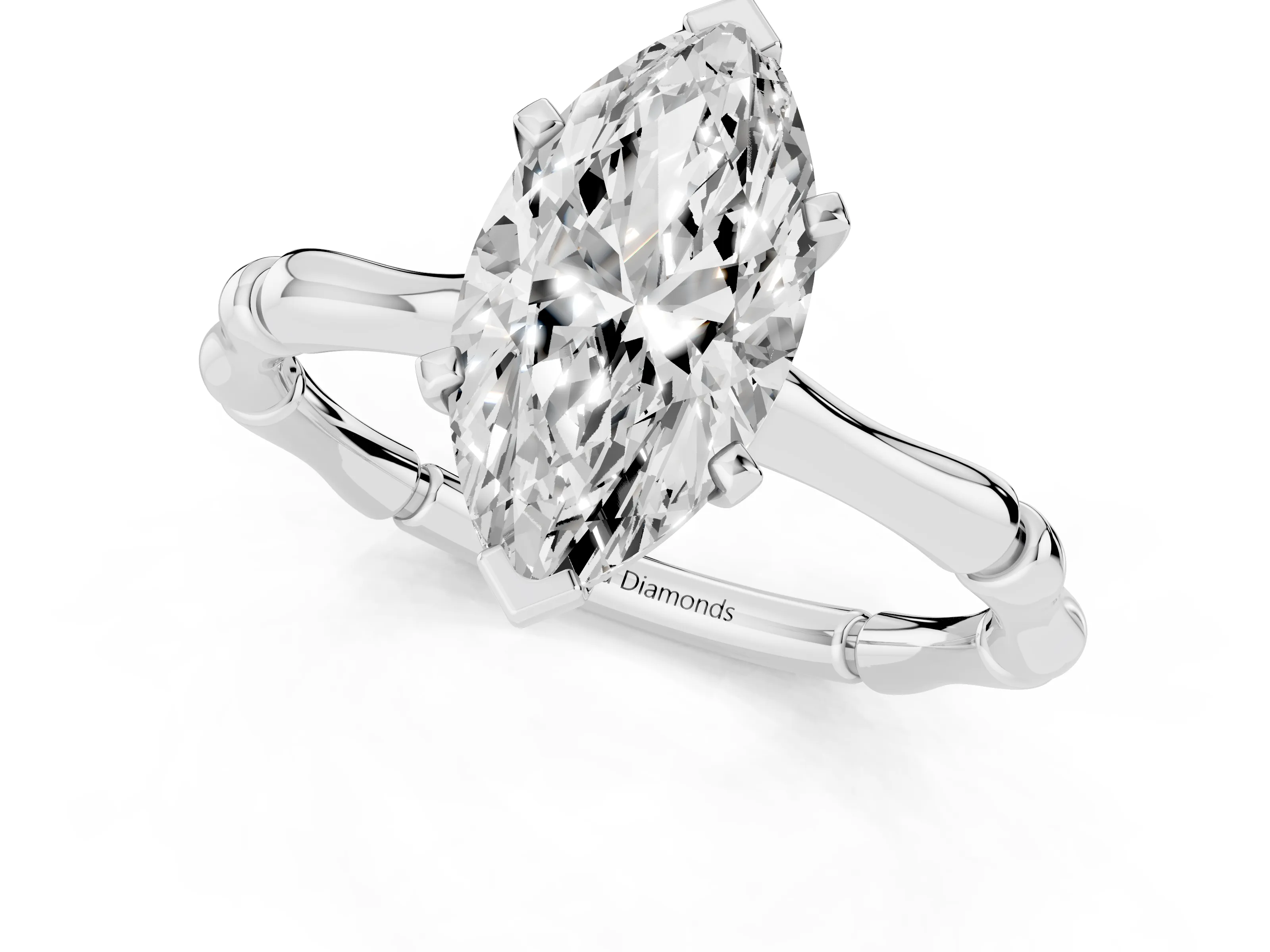 Marquise Cut Diamond Solitaire Ring Set in Platinum with Bamboo Band and Prong Setting
