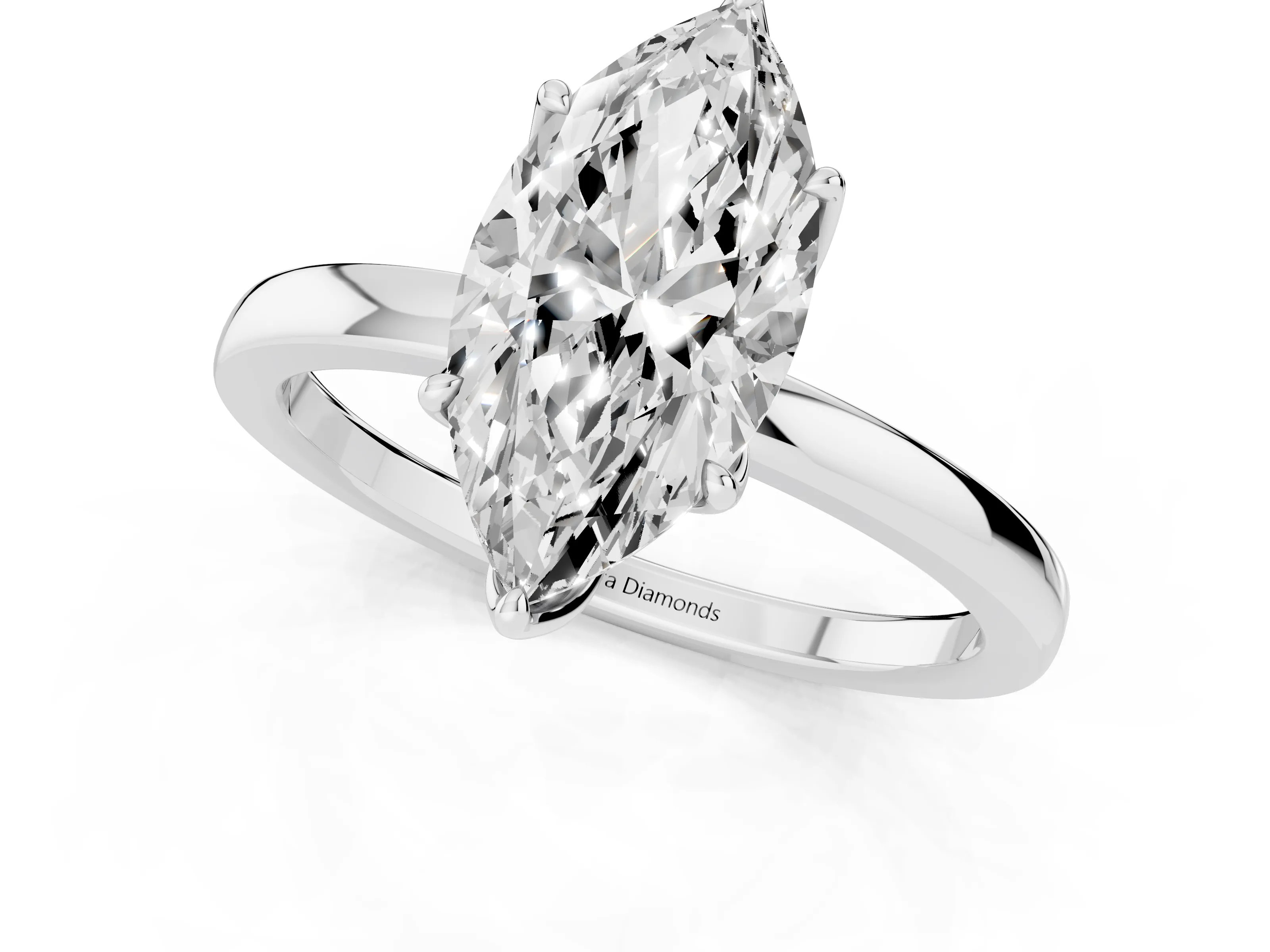 Marquise Cut Diamond Solitaire Ring Set in White gold with Prong Setting and Thin Polished Band