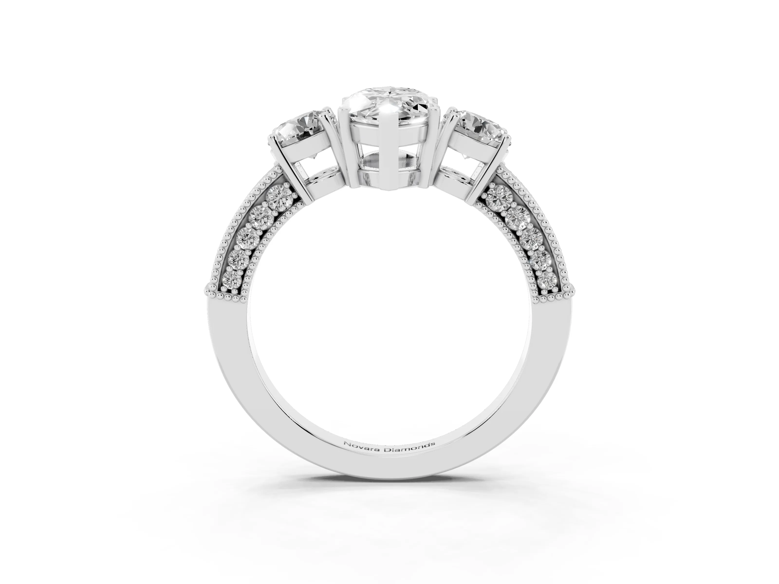 Marquise Cut Diamond Three-Stone Ring Set in Platinum with Round Side Stones and Pavé Band