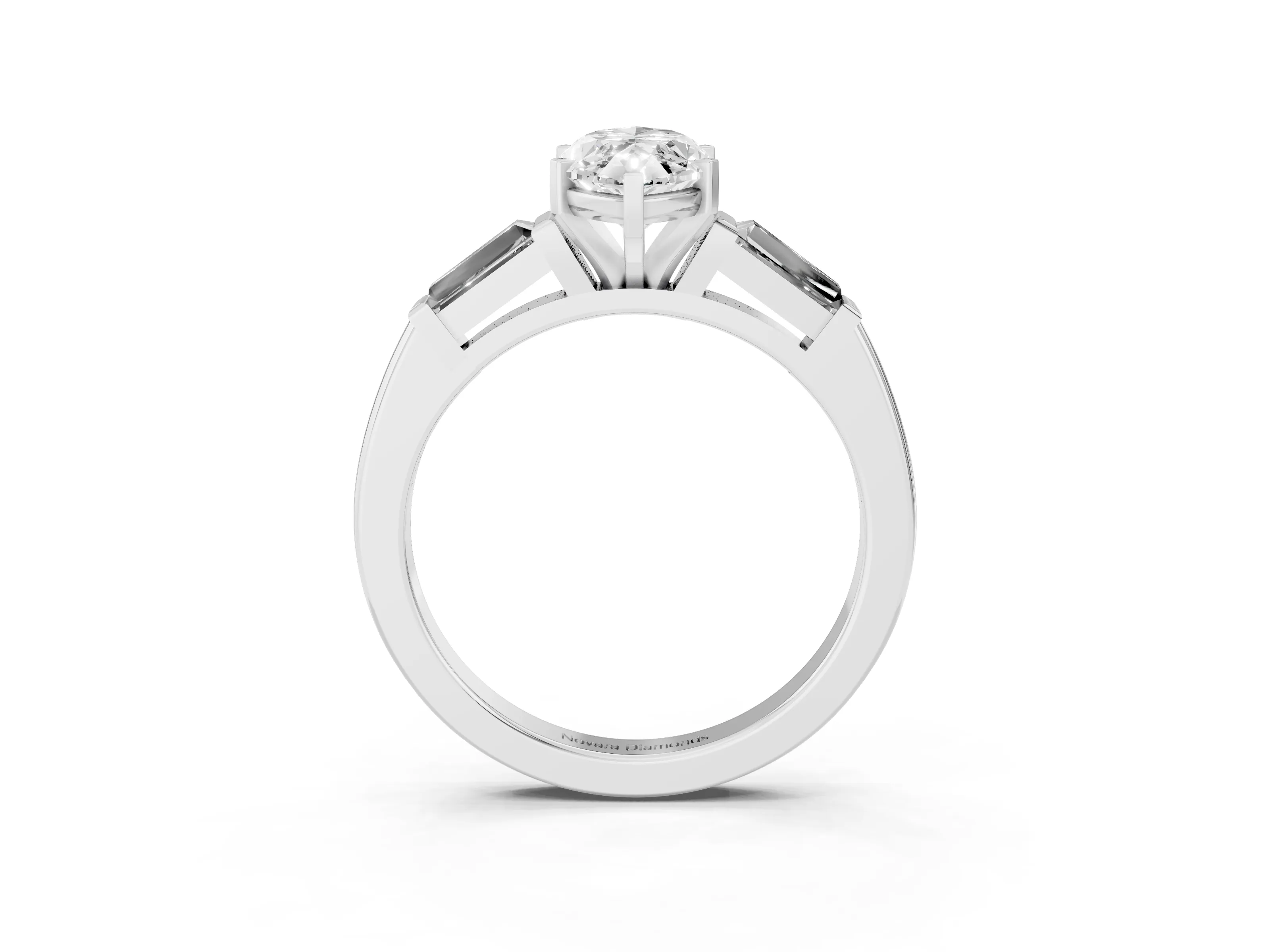 Marquise Cut Diamond Solitaire Ring Set in White gold with Tapered Baguette Side Stones and Prong Setting