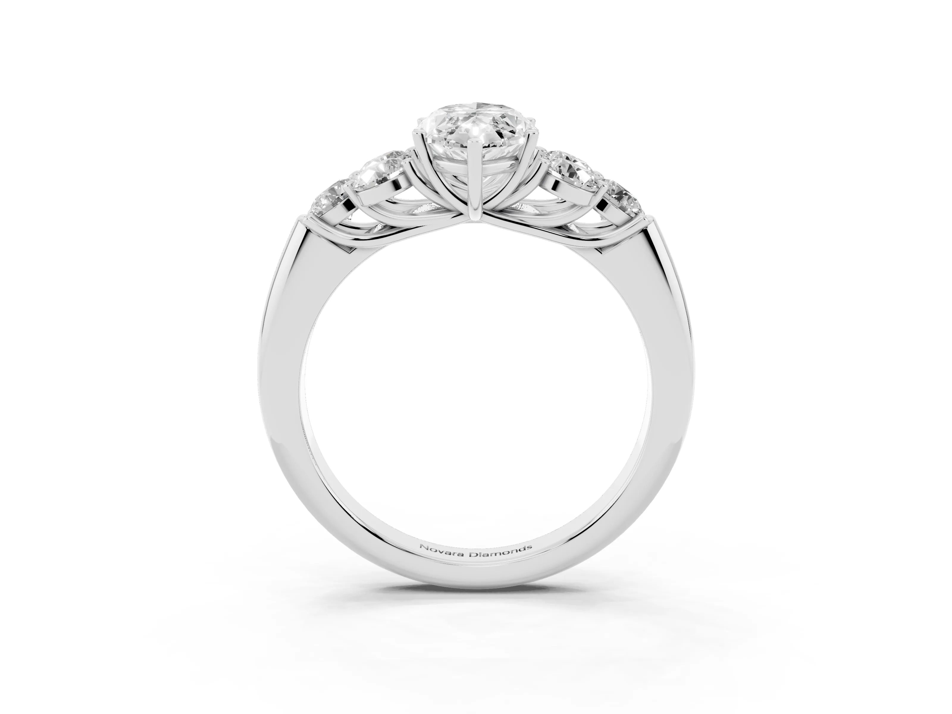 Marquise Cut Diamond Cluster Ring Set in Platinum with Round Accent Stones and Prong Setting on a Plain Band