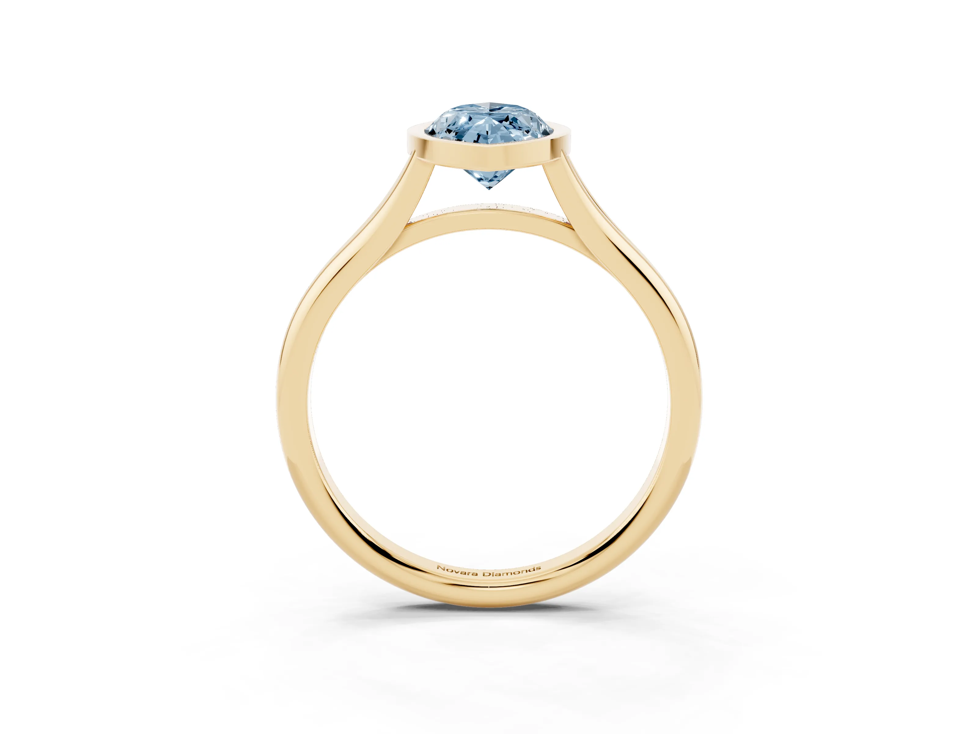 Fancy Blue Bezel Set Marquise Cut Diamond Solitaire Ring Set in Yellow gold with Tapered Band