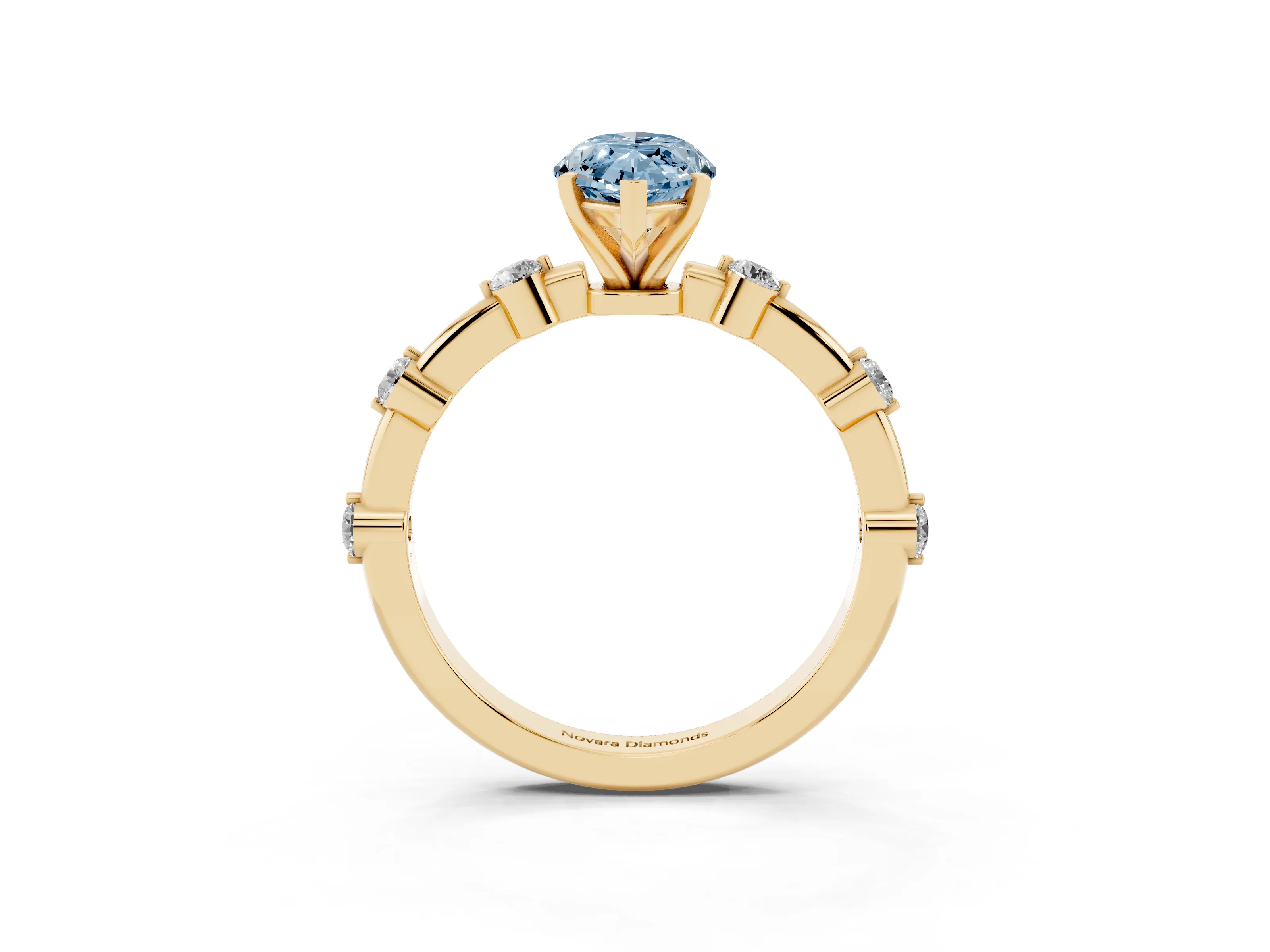 Fancy Blue Marquise Cut Diamond Solitaire Ring Set in Yellow gold with Bezel Set Side Stones and Prong Setting