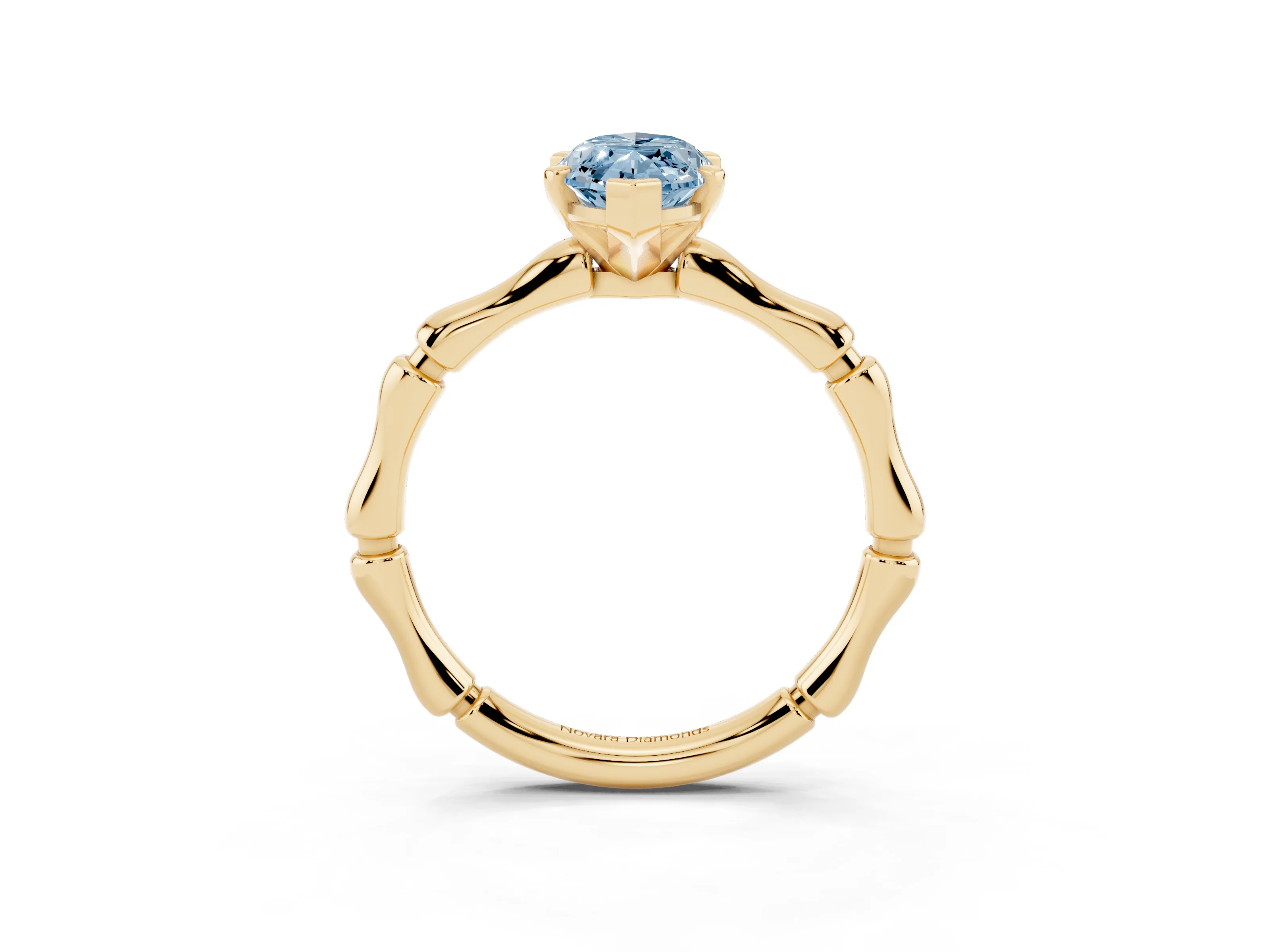 Fancy Blue Marquise Cut Diamond Solitaire Ring Set in Yellow gold with Bamboo Band and Prong Setting