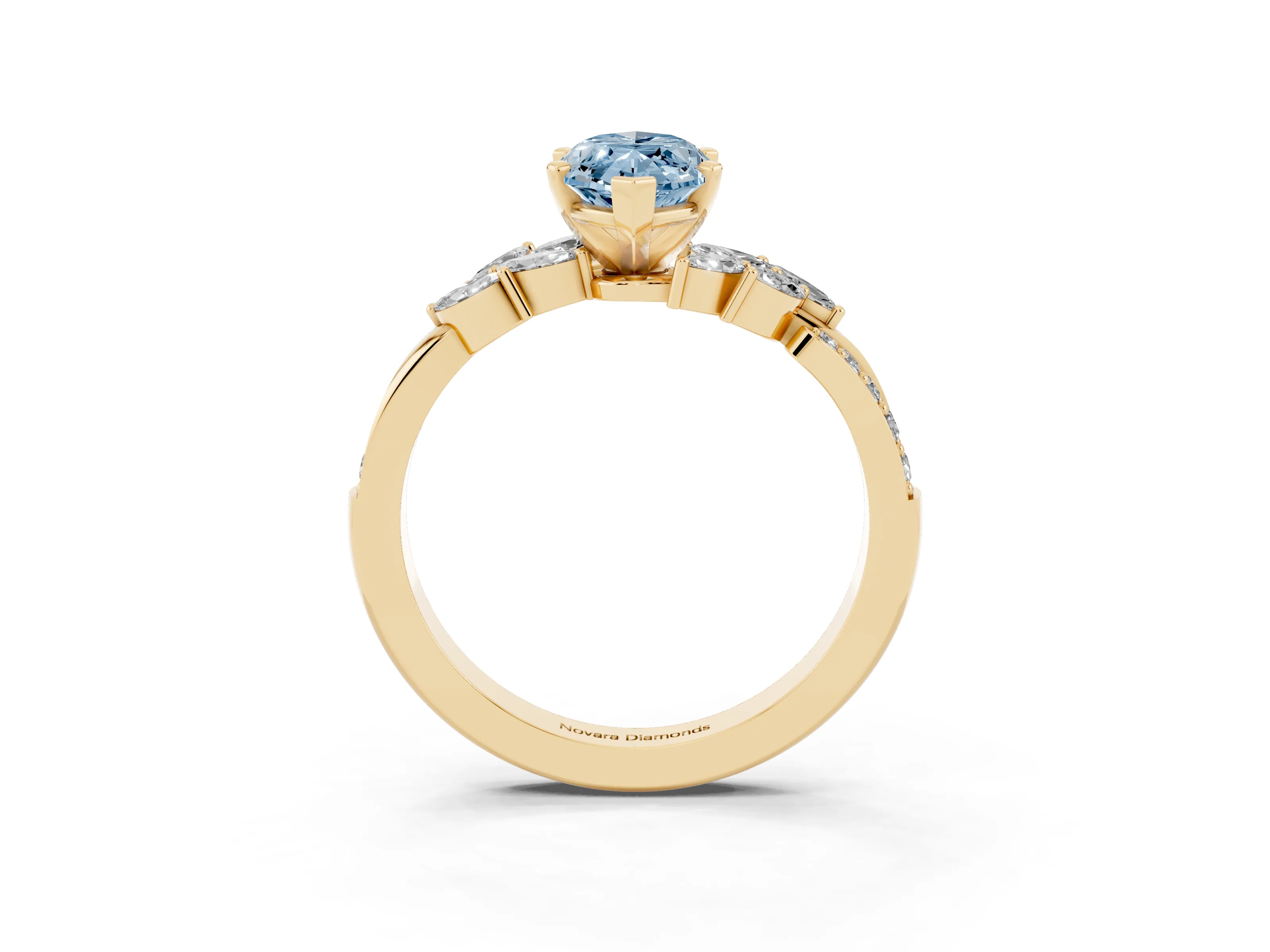 Fancy Blue Marquise Cut Diamond Solitaire Ring Set in Yellow gold with Marquise Twist Band and Prong Setting
