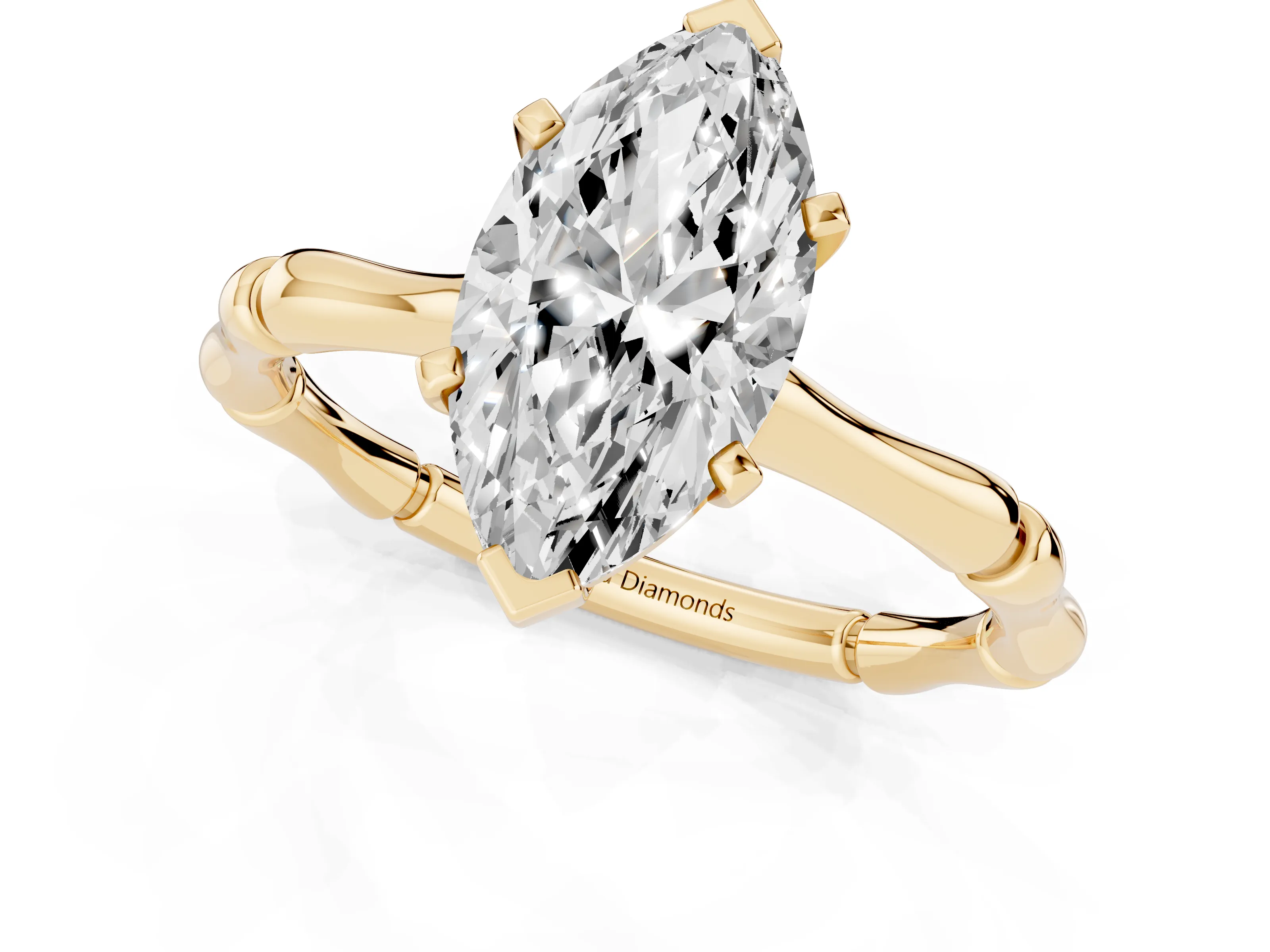 Marquise Cut Diamond Solitaire Ring Set in Yellow gold with Bamboo Band and Prong Setting