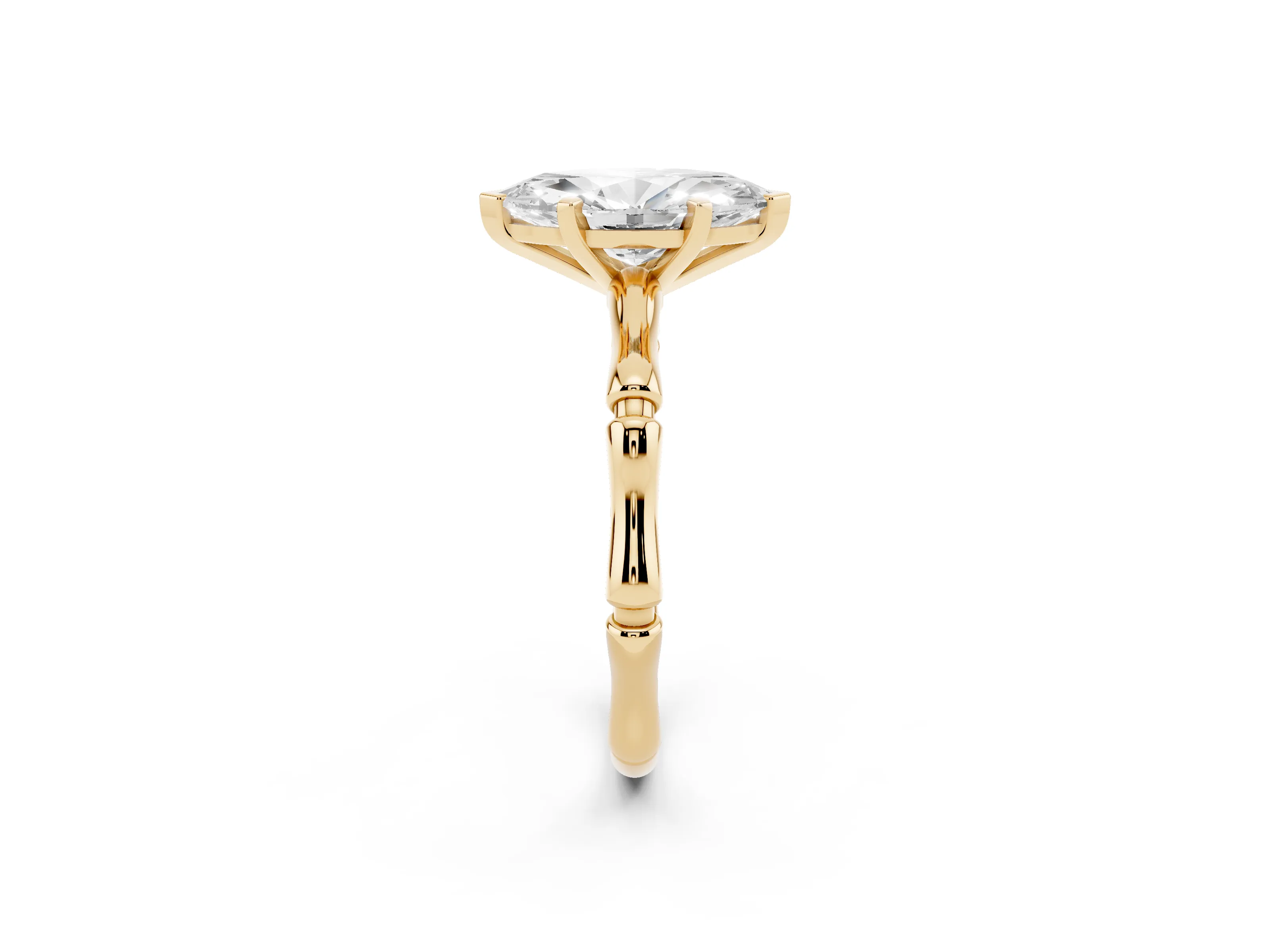 Marquise Cut Diamond Solitaire Ring Set in Yellow gold with Bamboo Band and Prong Setting
