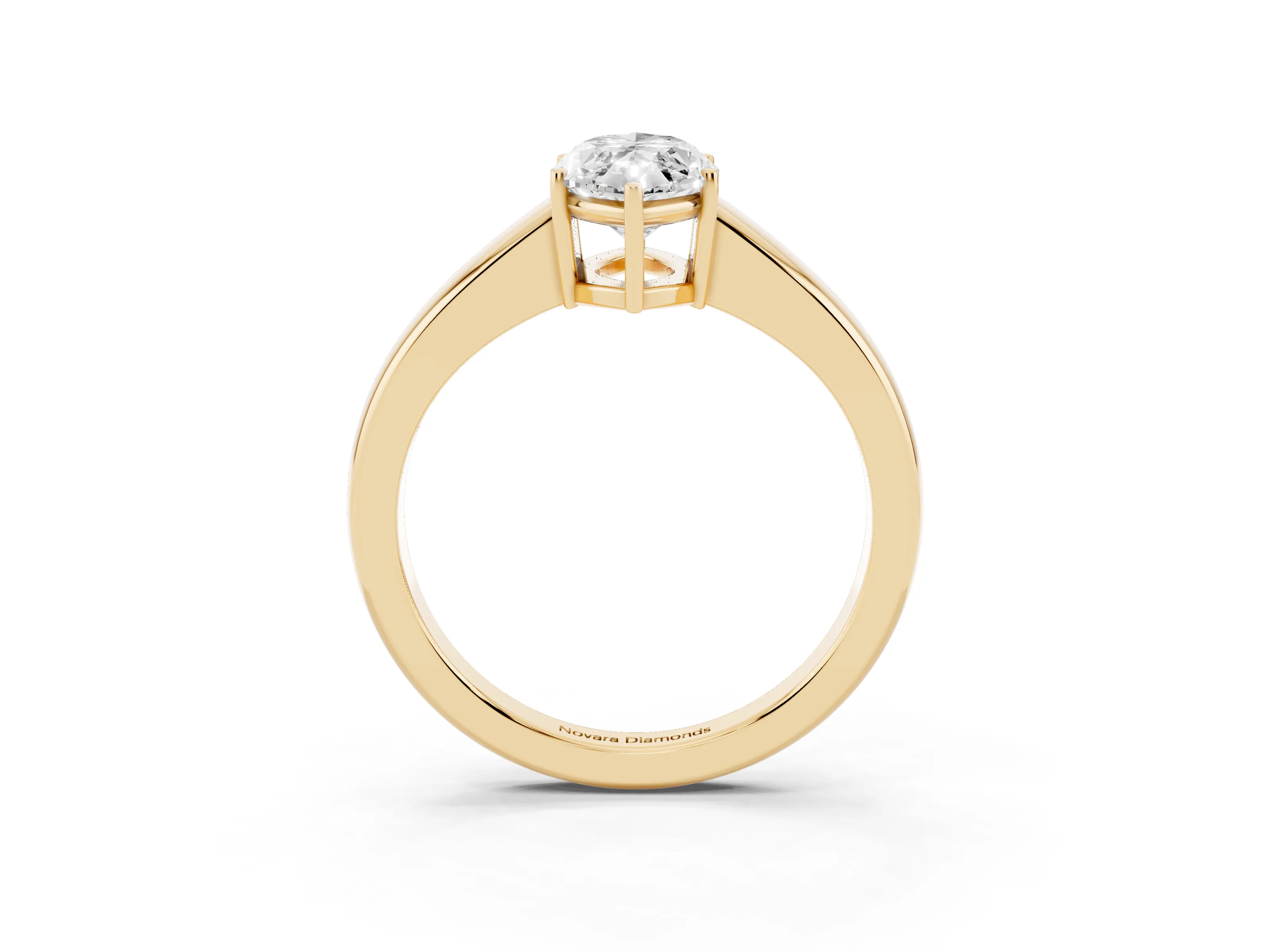 Marquise Cut Diamond Solitaire Ring Set in Yellow gold with Tapered Band and Prong Setting