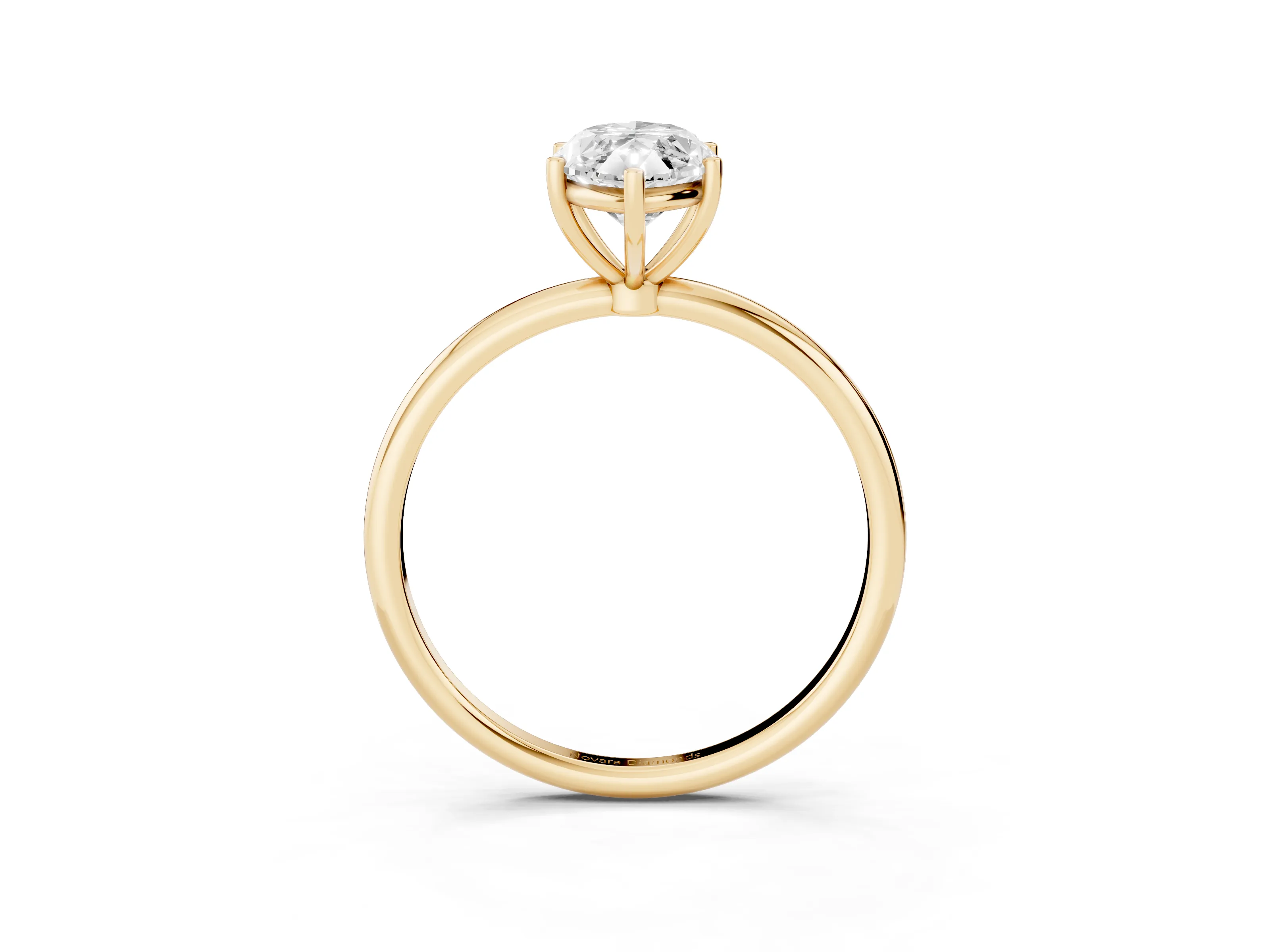 Marquise Cut Diamond Solitaire Engagement Ring Set in Yellow gold with Thin Band and Prong Setting