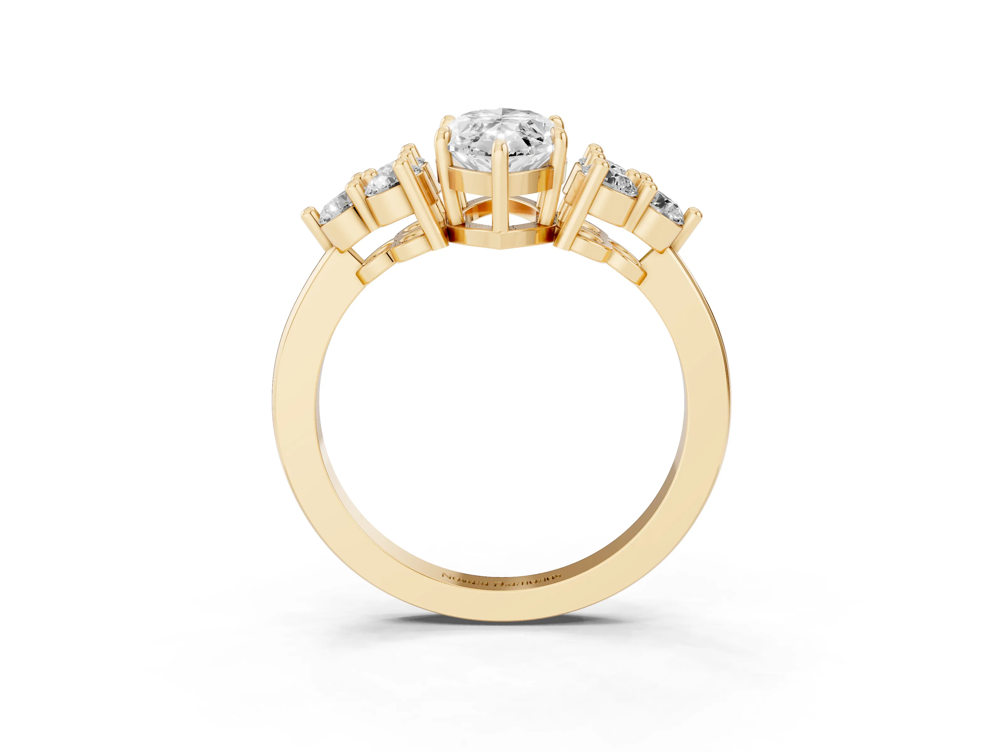 Marquise Cut Diamond Solitaire Ring Set in Yellow gold with Cluster Accents on Each Side