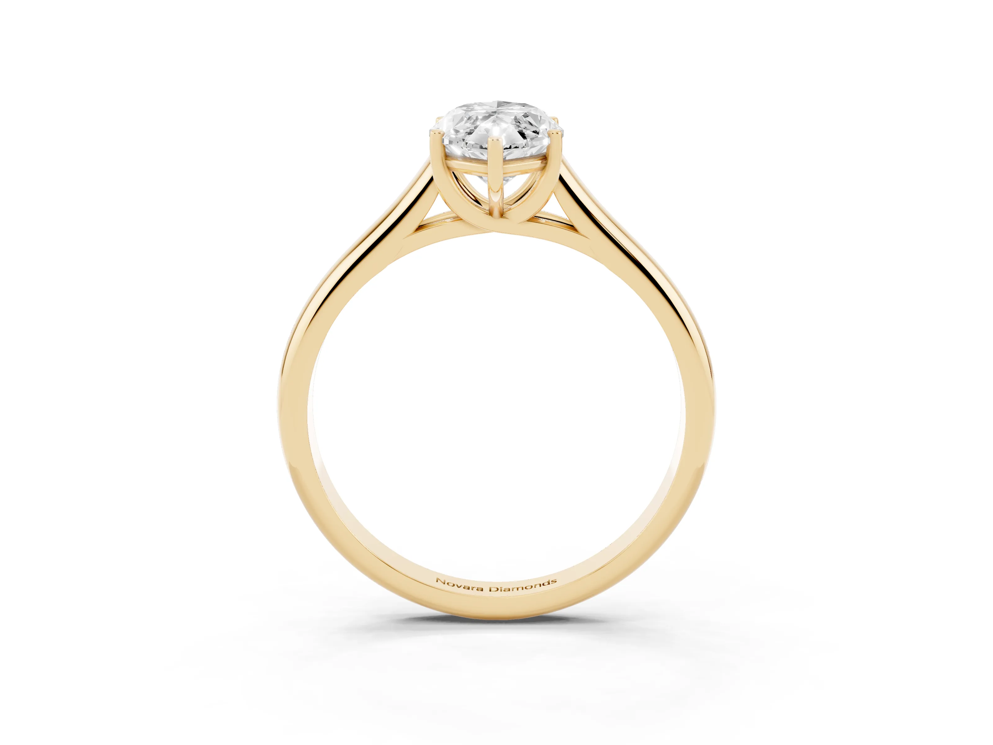 Marquise Cut Diamond Solitaire Engagement Ring Set in Yellow gold with Subtly Tapered Band and Prong Setting