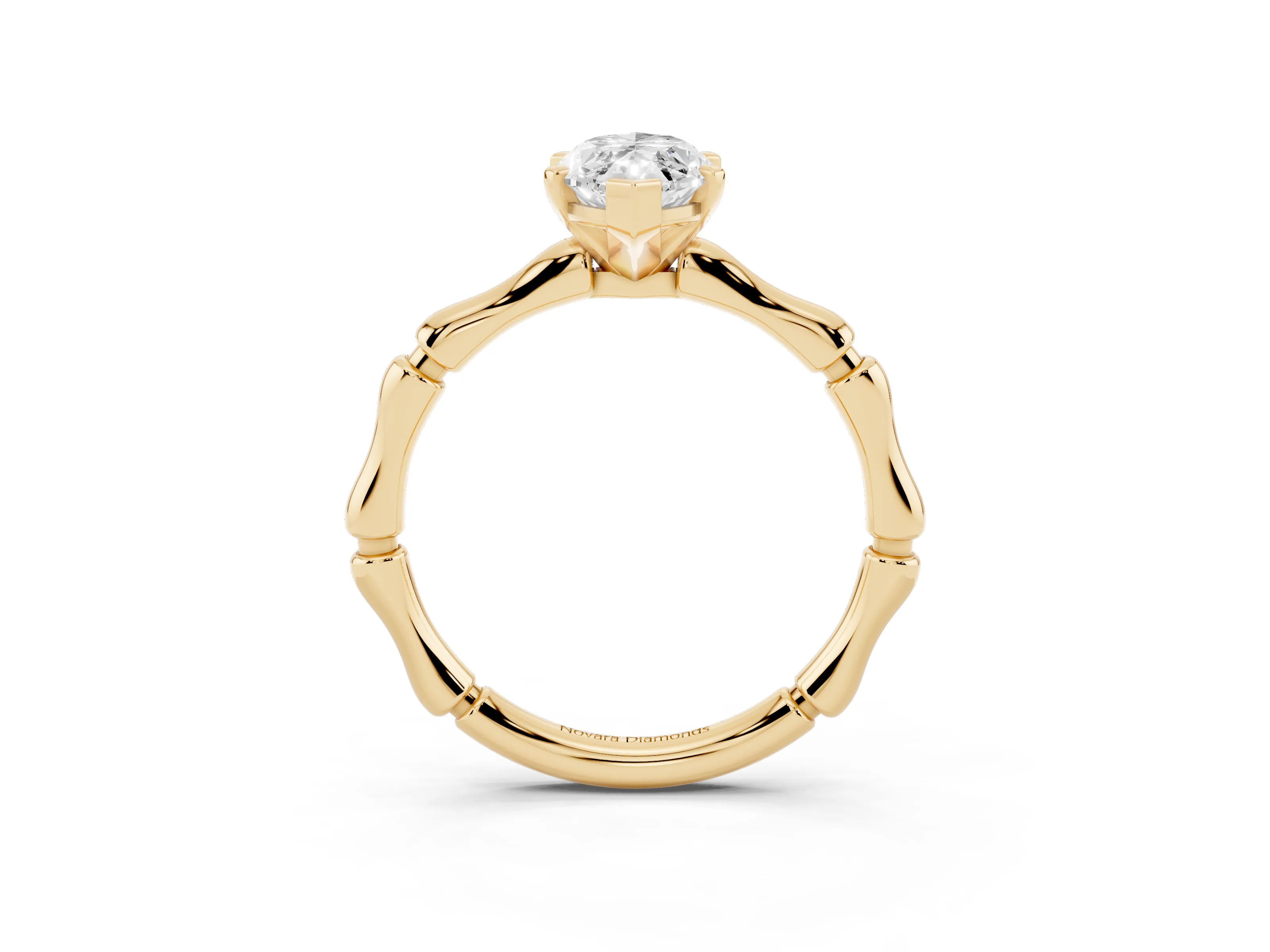 Marquise Cut Diamond Solitaire Ring Set in Yellow gold with Bamboo Band and Prong Setting