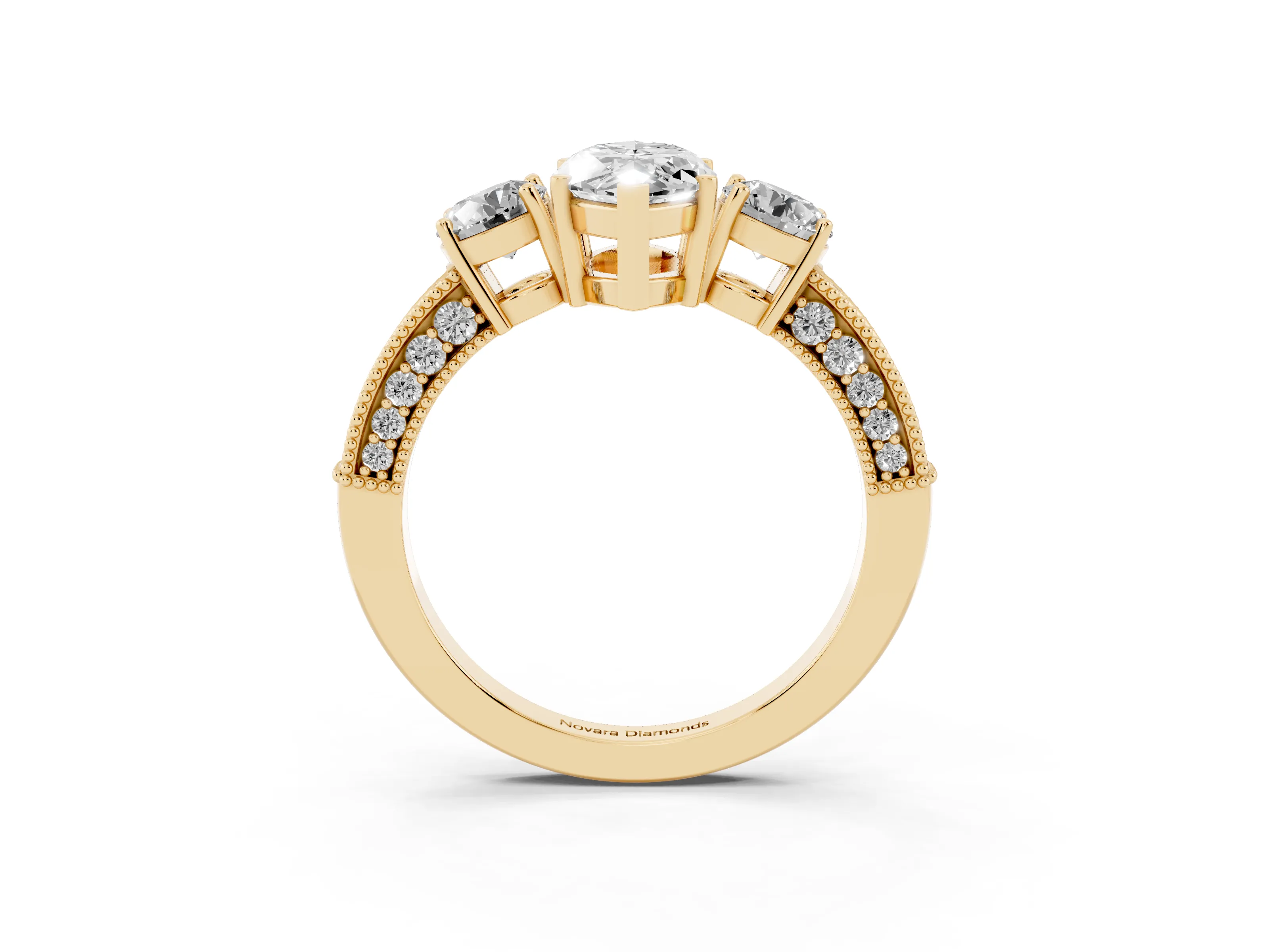 Marquise Cut Diamond Three-Stone Ring Set in Yellow gold with Round Side Stones and Pavé Band